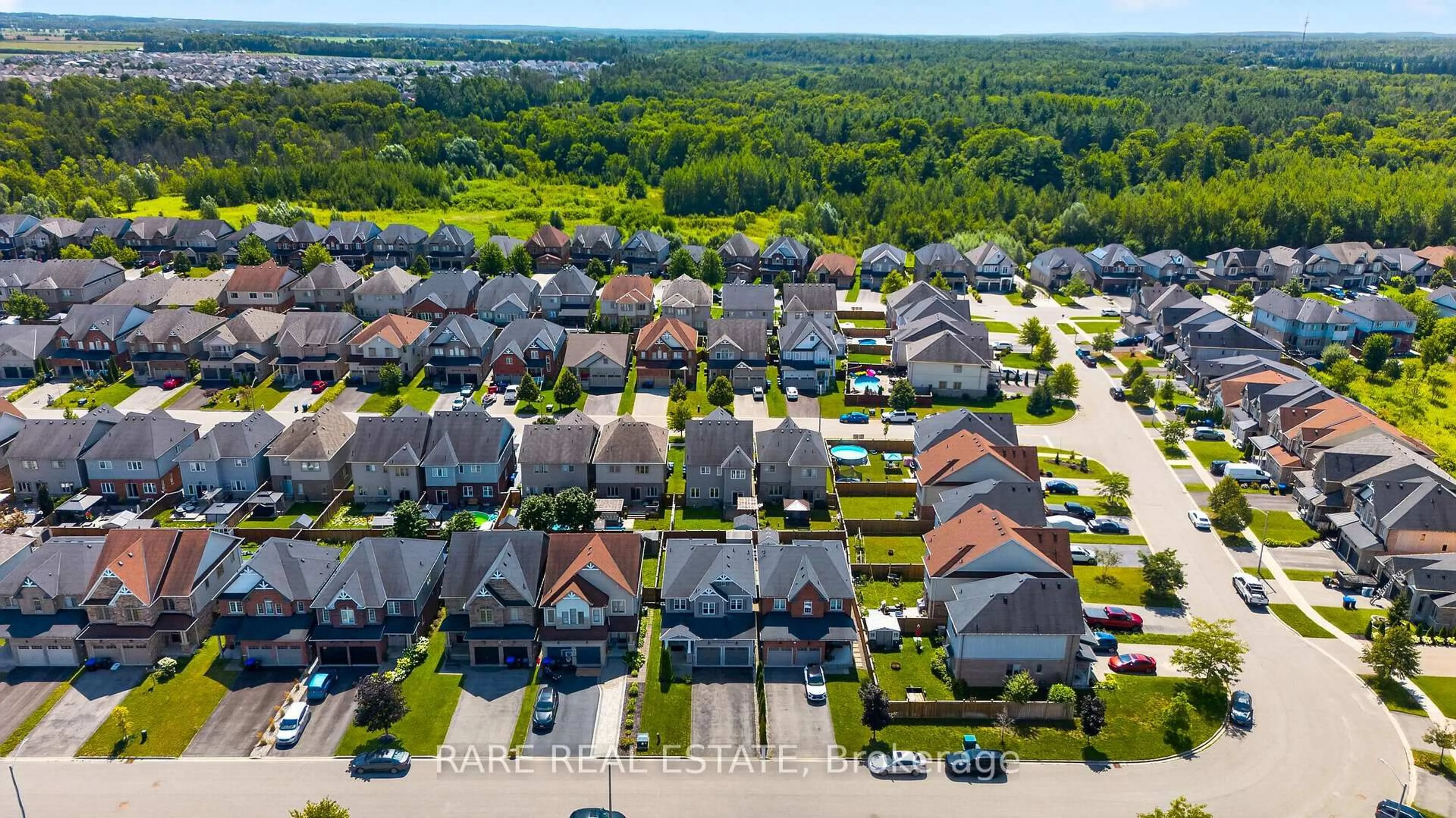 A pic from outside/outdoor area/front of a property/back of a property/a pic from drone, street for 69 Decarolis Cres, Essa Ontario L3W 0B2