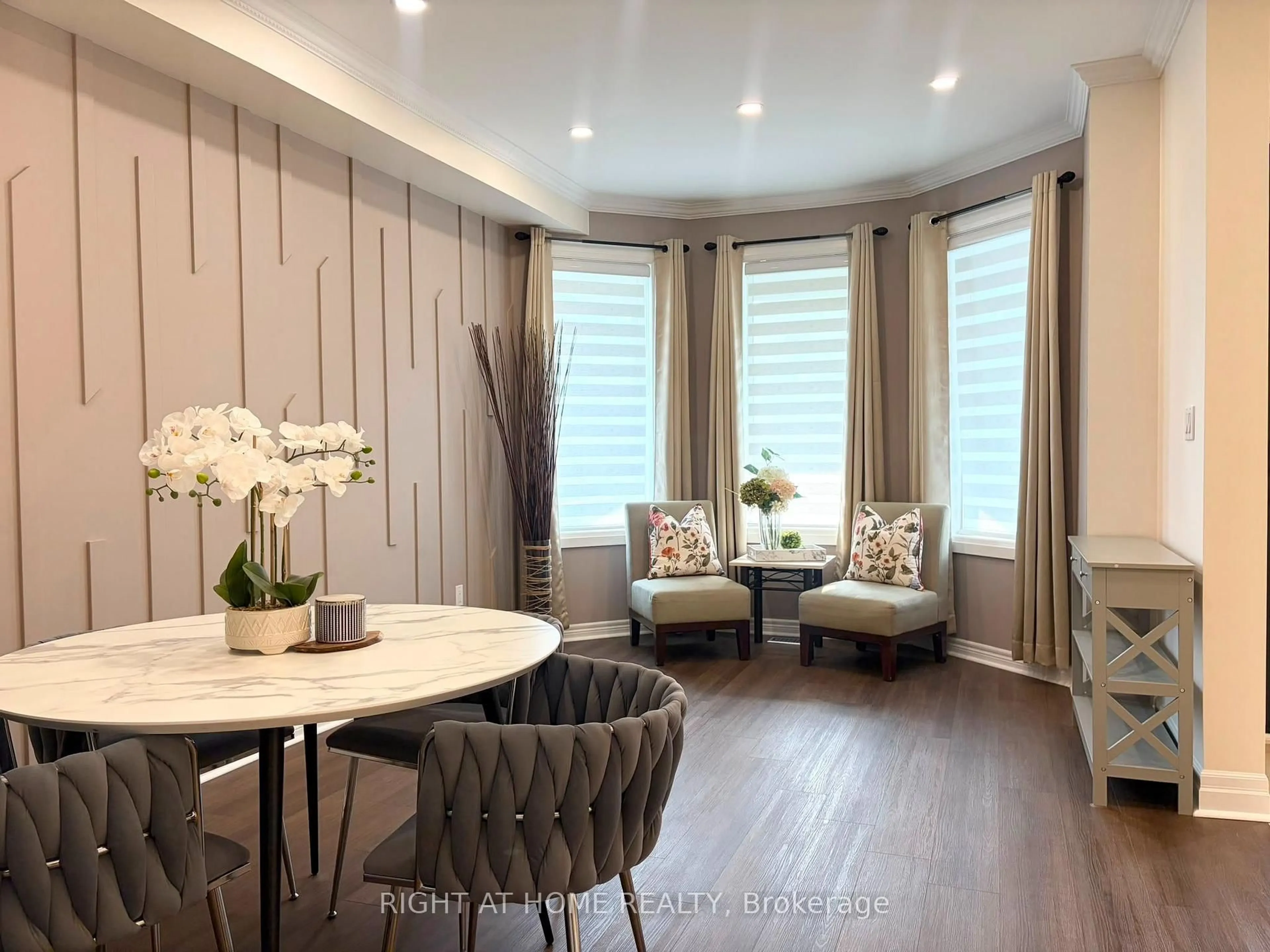 Living room with furniture, wood/laminate floor for 111 Forecastle Rd, Vaughan Ontario L4K 5H9