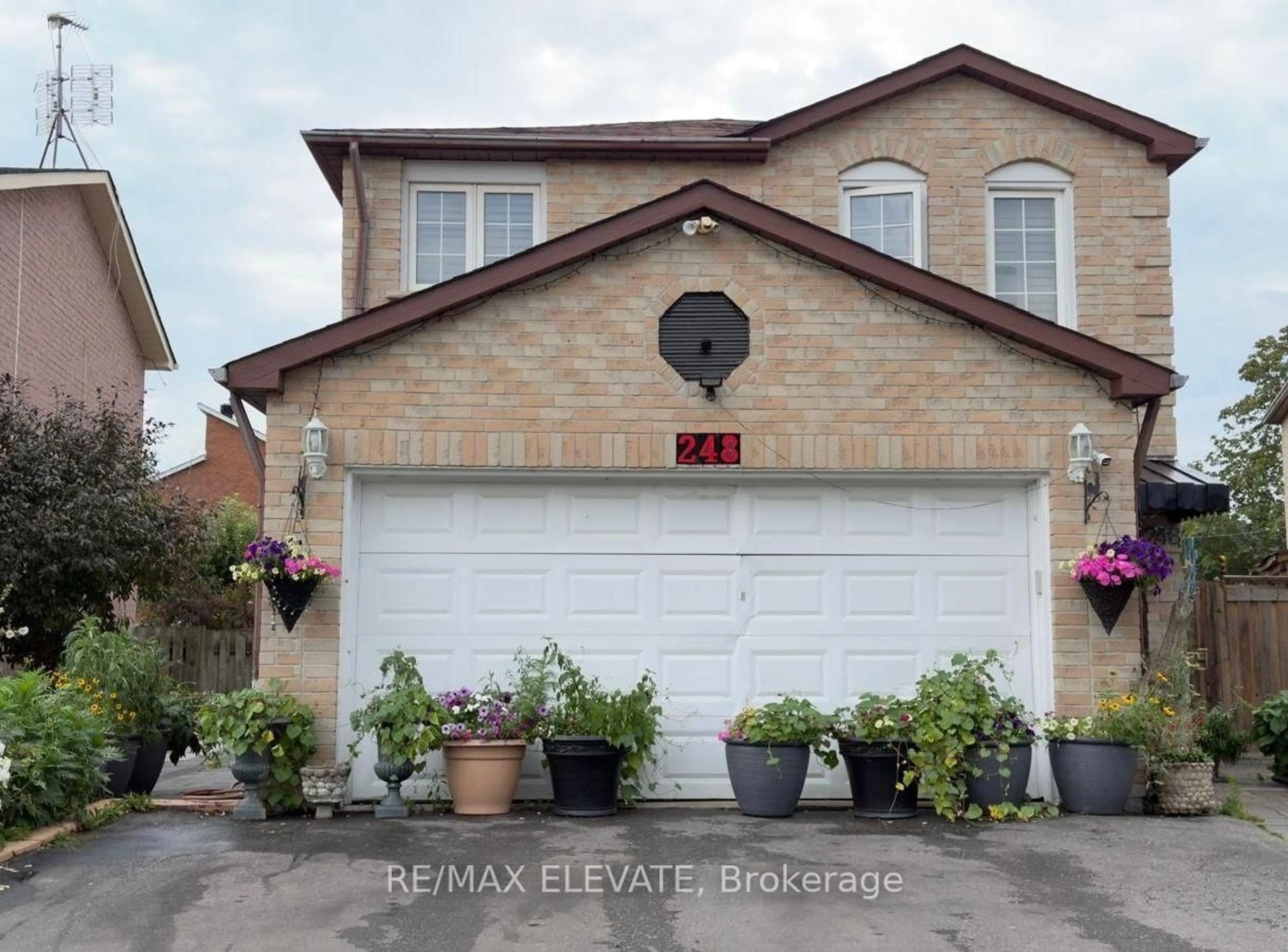 Home with brick exterior material, street for 248 Woodhall Rd, Markham Ontario L3S 1N2