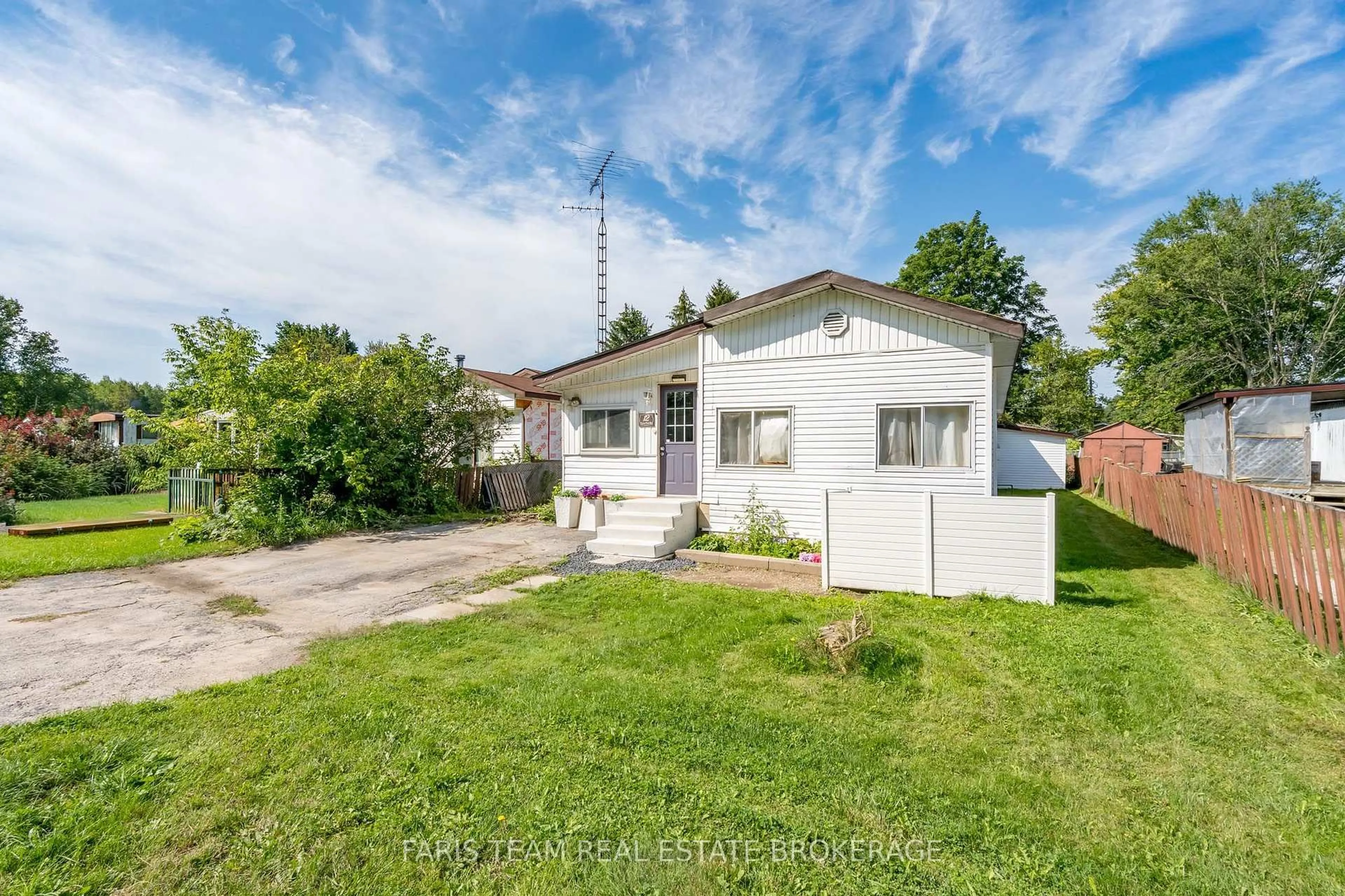 A pic from outside/outdoor area/front of a property/back of a property/a pic from drone, street for 12 Centre Park Rd, Essa Ontario L0M 1B1