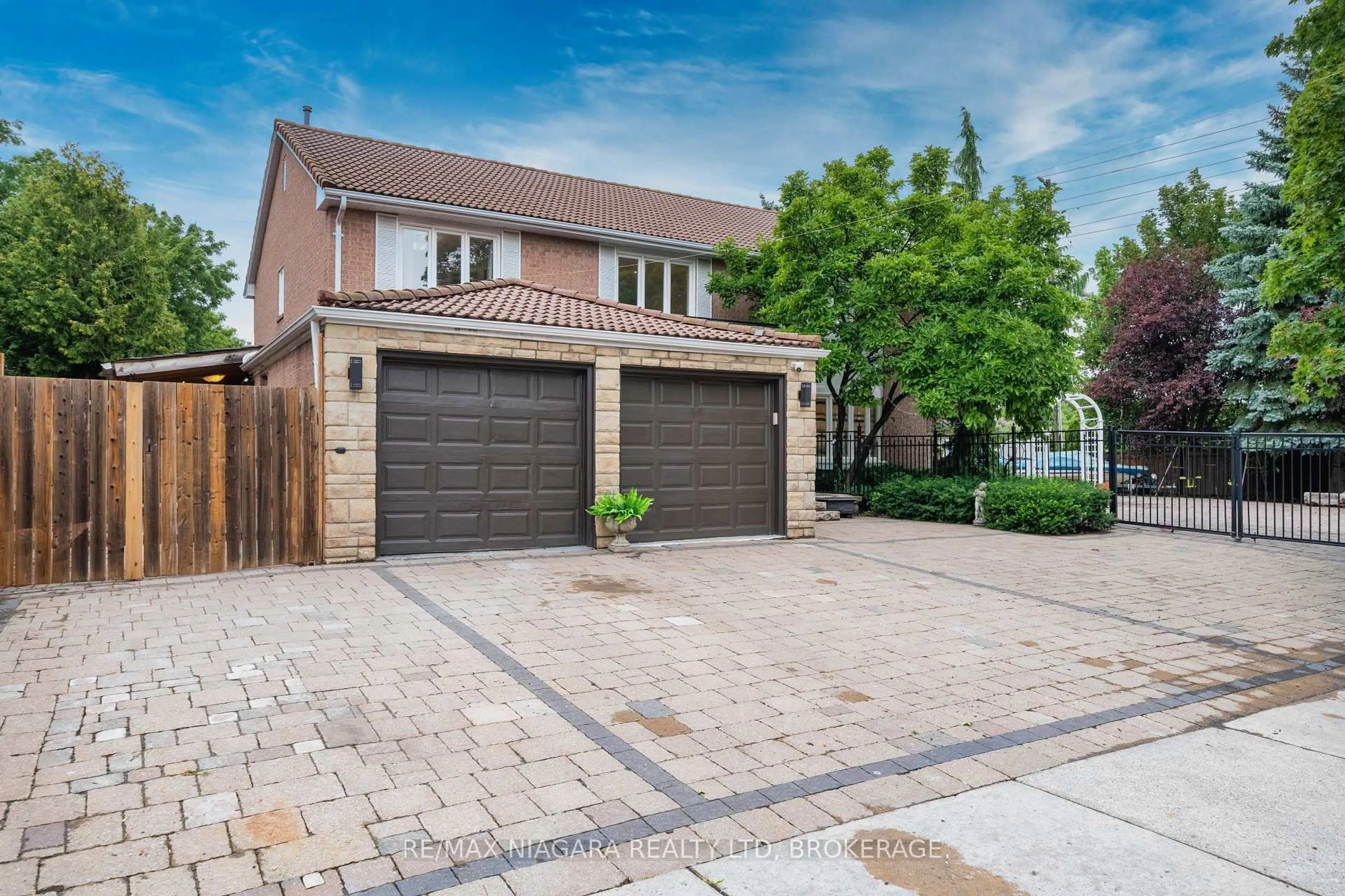 Home with brick exterior material, street for 2 Aitken Circ, Markham Ontario L3R 7K6