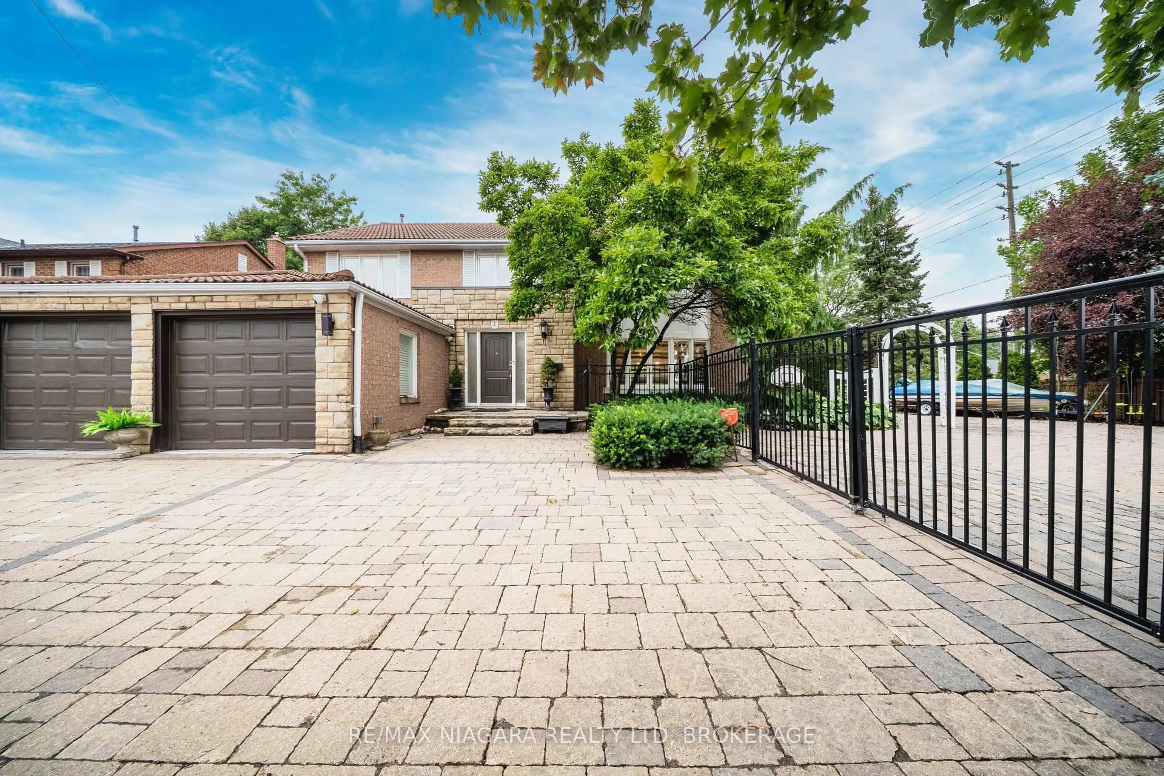 Home with brick exterior material, street for 2 Aitken Circ, Markham Ontario L3R 7K6