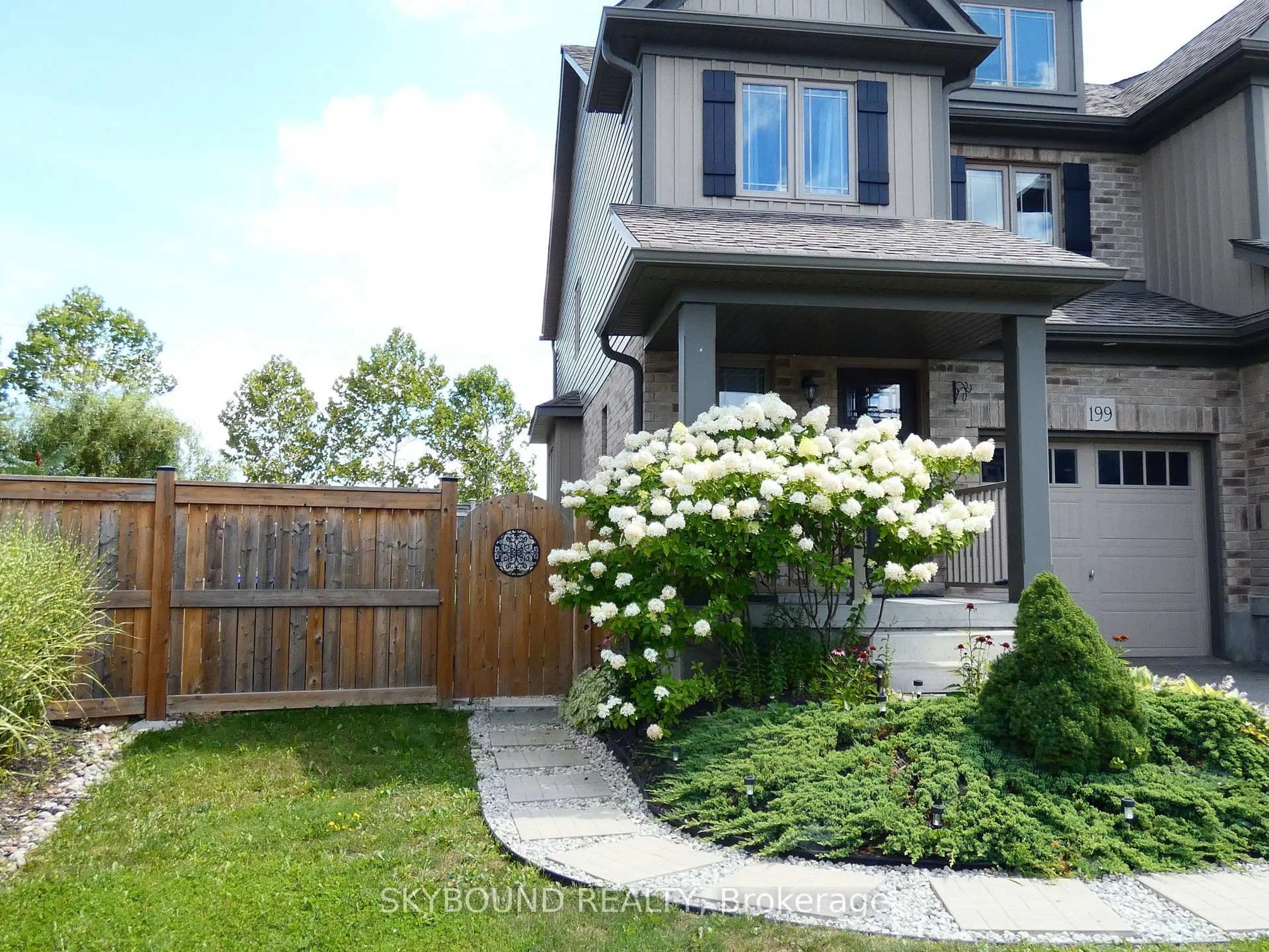 Home with brick exterior material, street for 199 Hutchinson Dr, New Tecumseth Ontario L9R 0P9