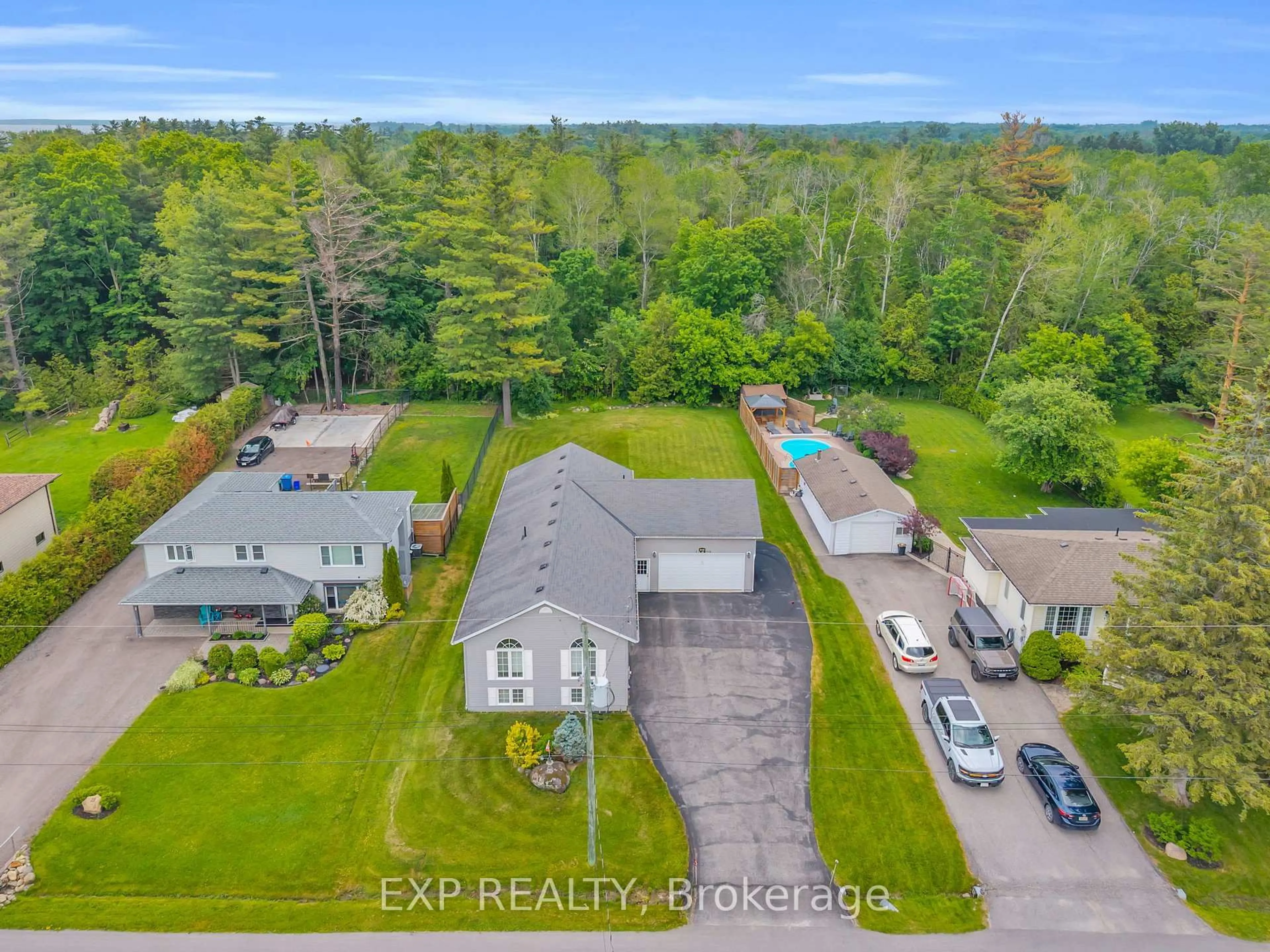 A pic from outside/outdoor area/front of a property/back of a property/a pic from drone, water/lake/river/ocean view for 21 Sunnidale Blvd, Georgina Ontario L0E 1L0