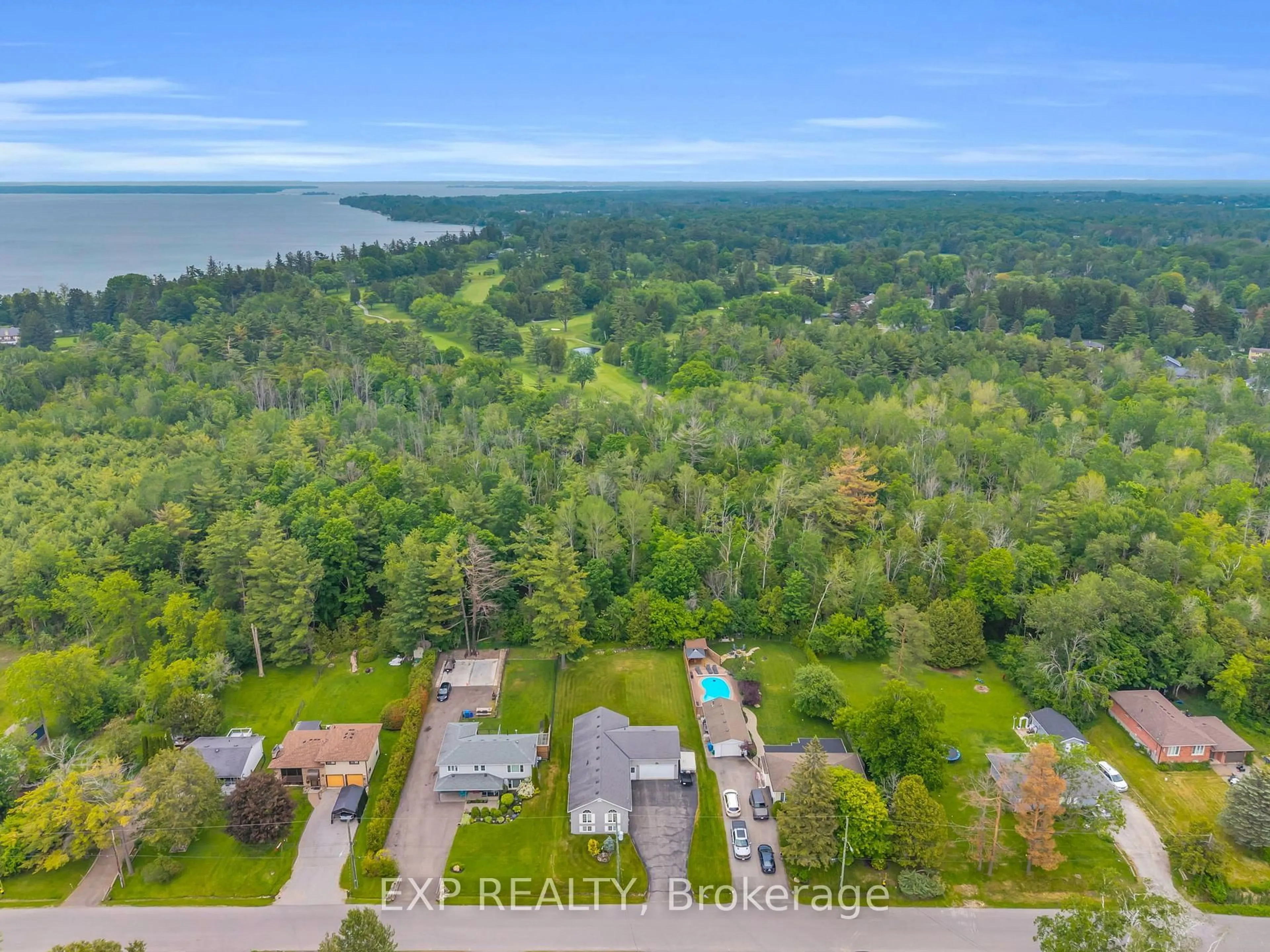 A pic from outside/outdoor area/front of a property/back of a property/a pic from drone, water/lake/river/ocean view for 21 Sunnidale Blvd, Georgina Ontario L0E 1L0