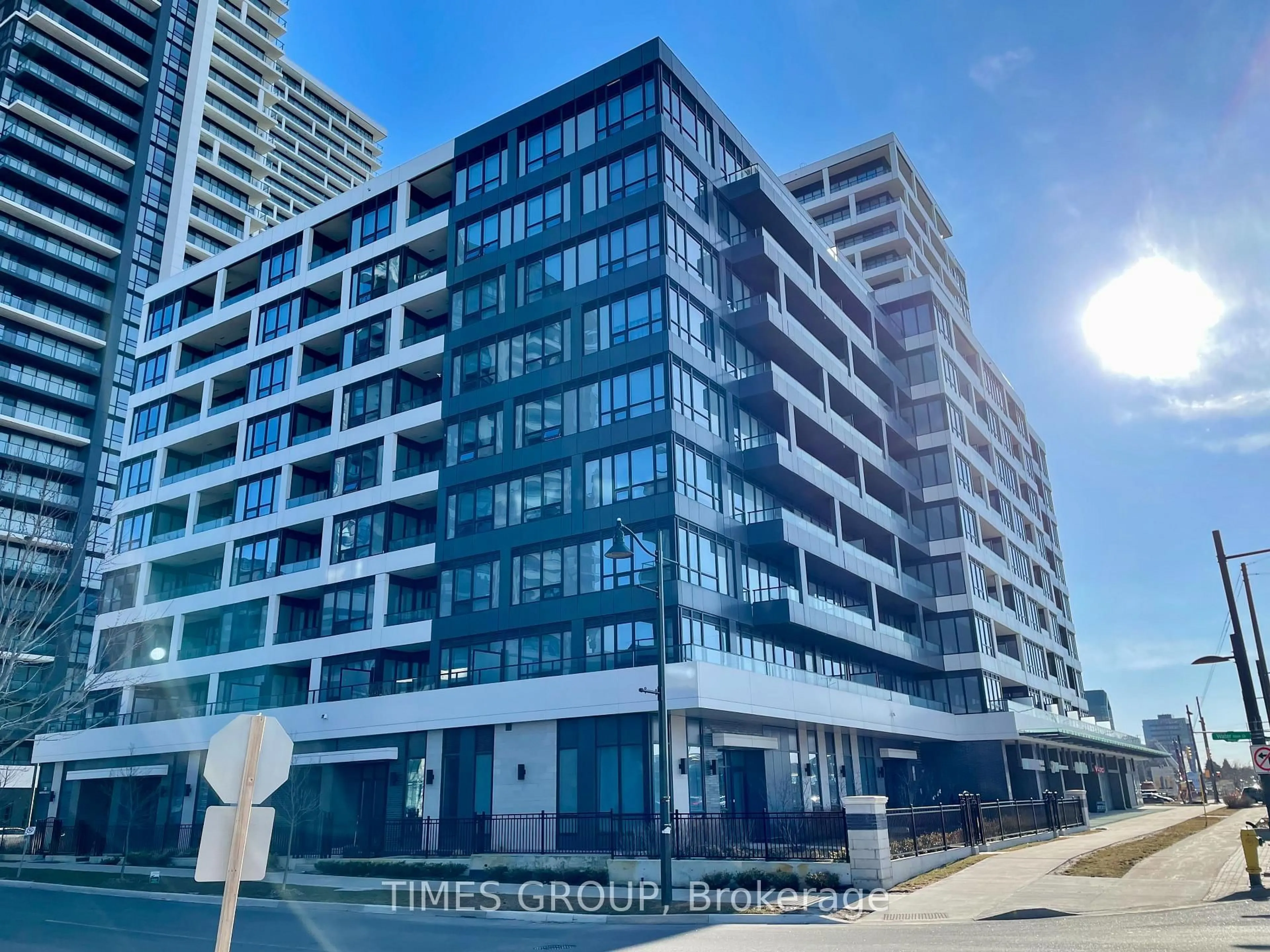 A pic from outside/outdoor area/front of a property/back of a property/a pic from drone, building for 38 Water Walk Dr #318, Markham Ontario L3R 6M8