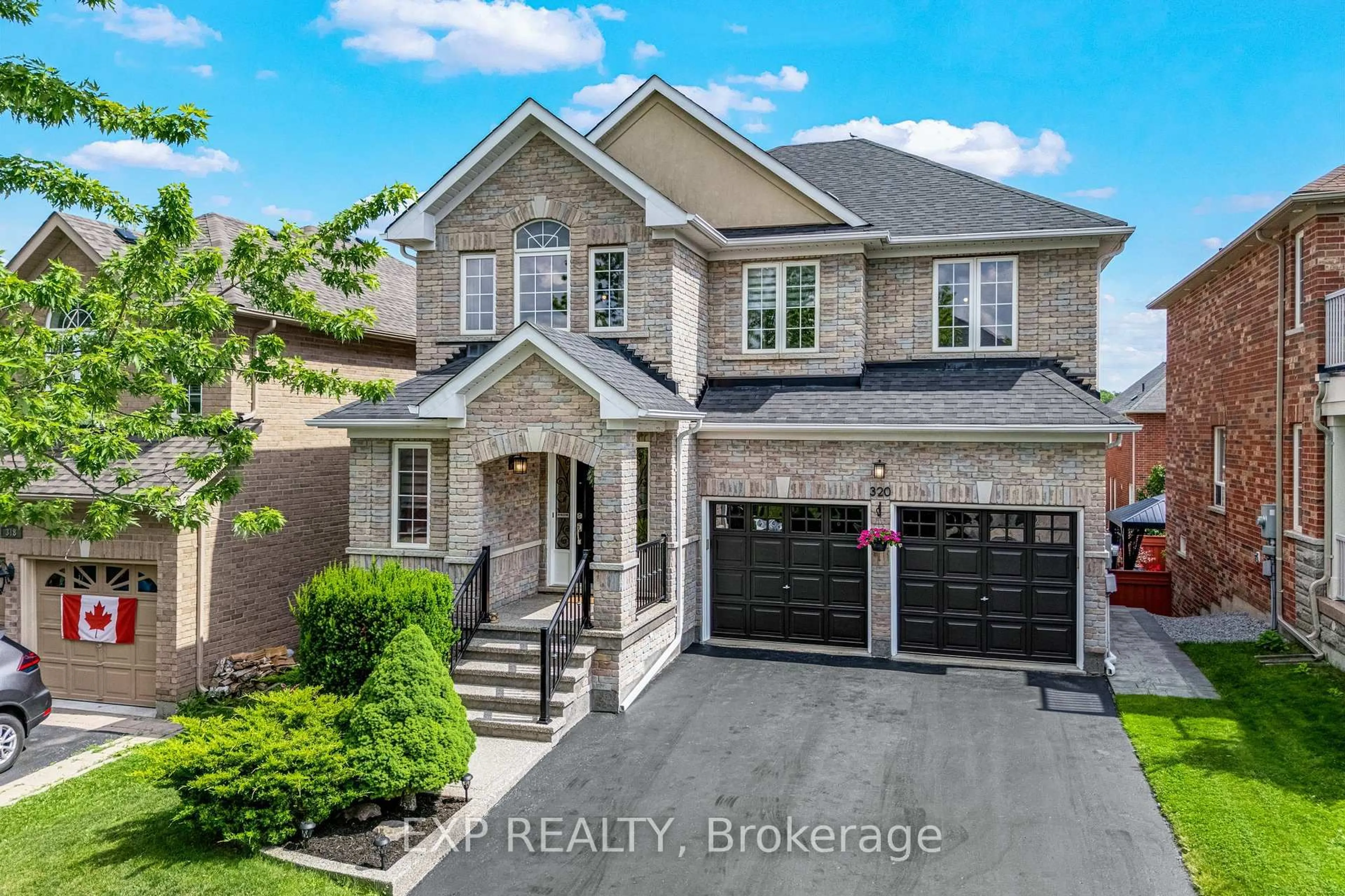 Home with brick exterior material, street for 320 Dowson Loop, Newmarket Ontario L3X 3G2