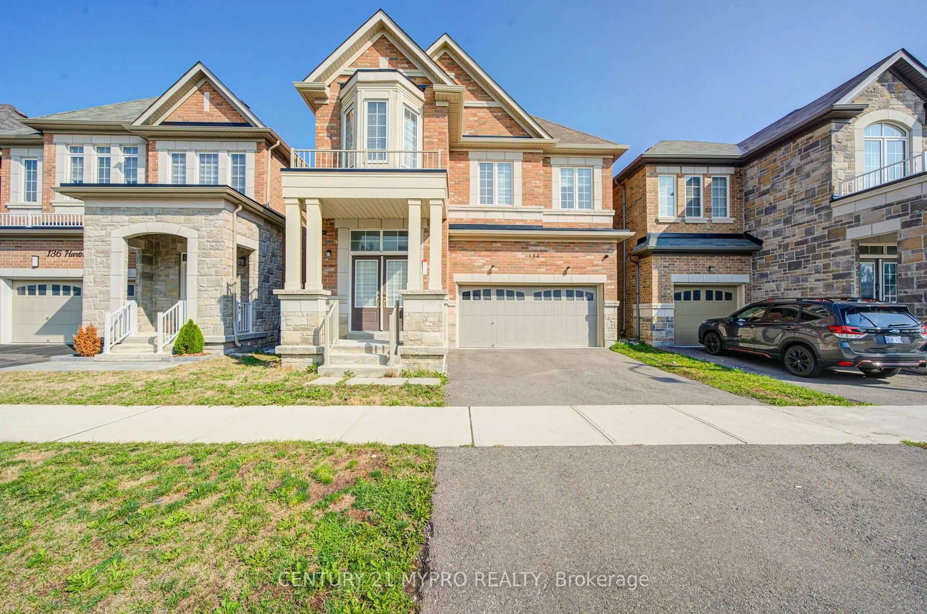 Home with brick exterior material, street for 134 Hartney Dr, Richmond Hill Ontario L4S 1N2