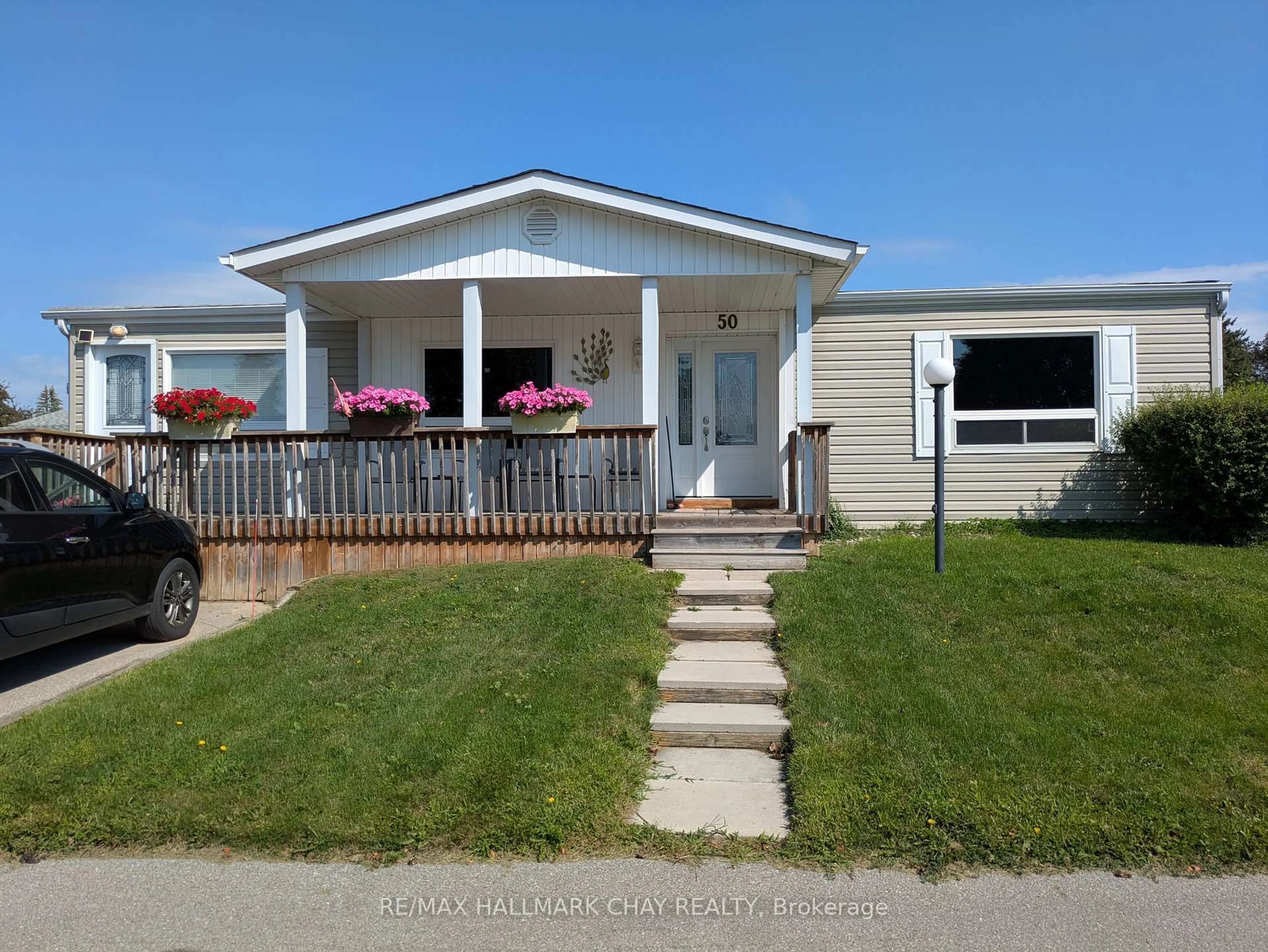 Home with vinyl exterior material, street for 50 Linden Lane, Innisfil Ontario L9S 1P2