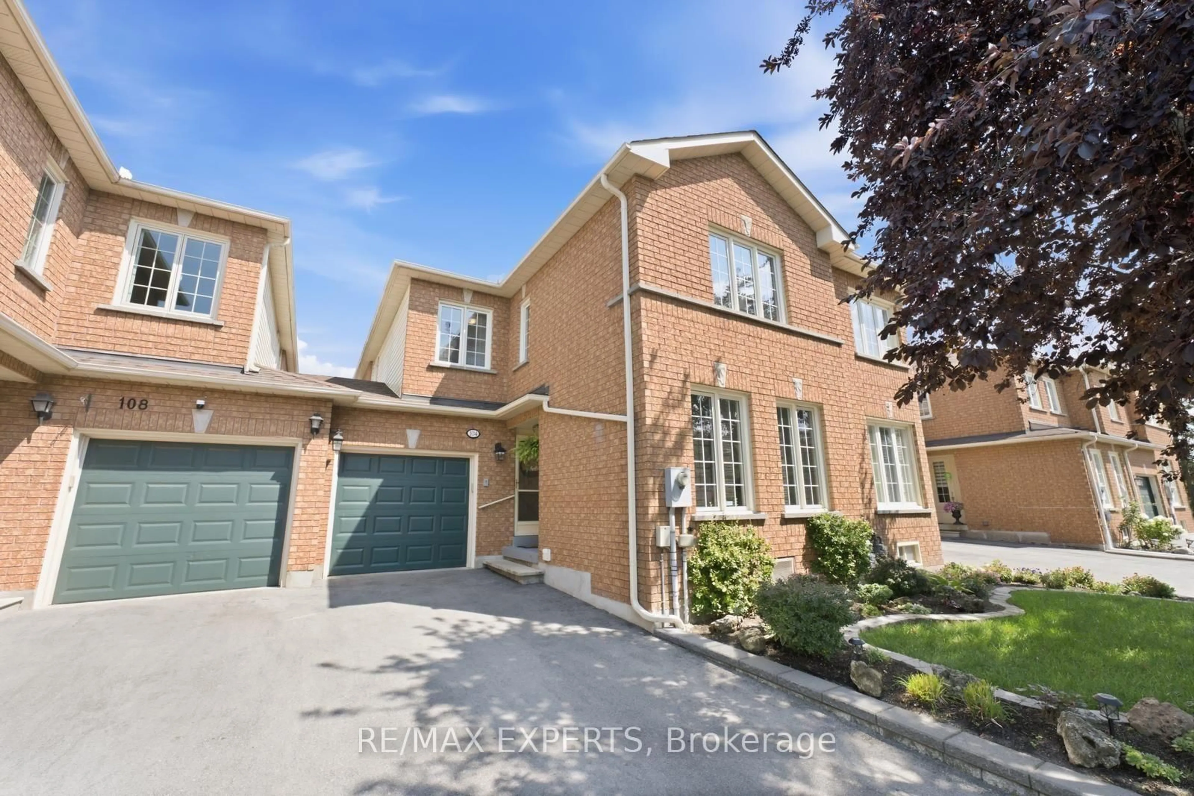 Home with brick exterior material, street for 104 Pinedale Gate, Vaughan Ontario L4L 8X3