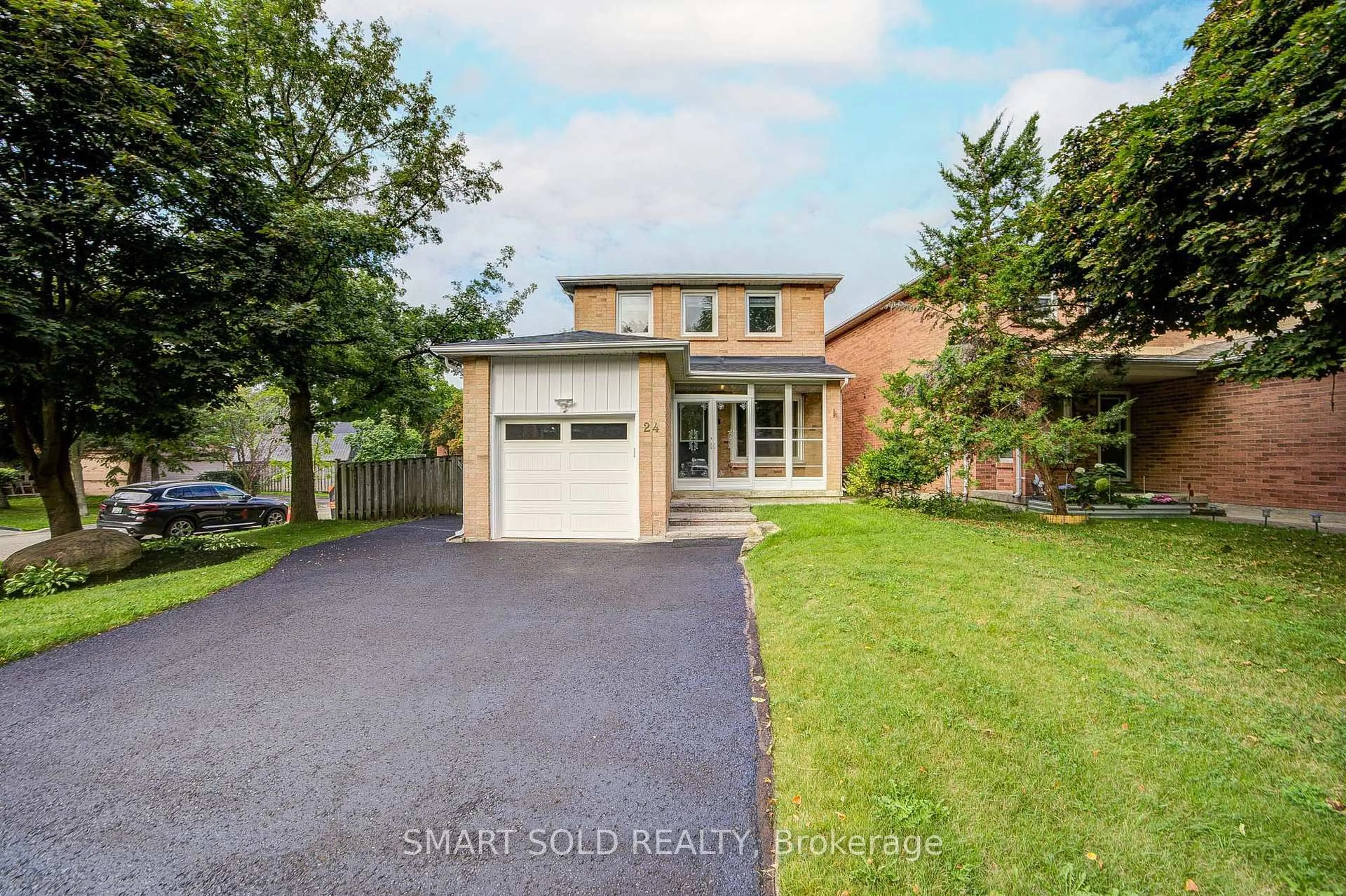 Home with brick exterior material, street for 24 Snider Dr, Markham Ontario L3P 6Y5