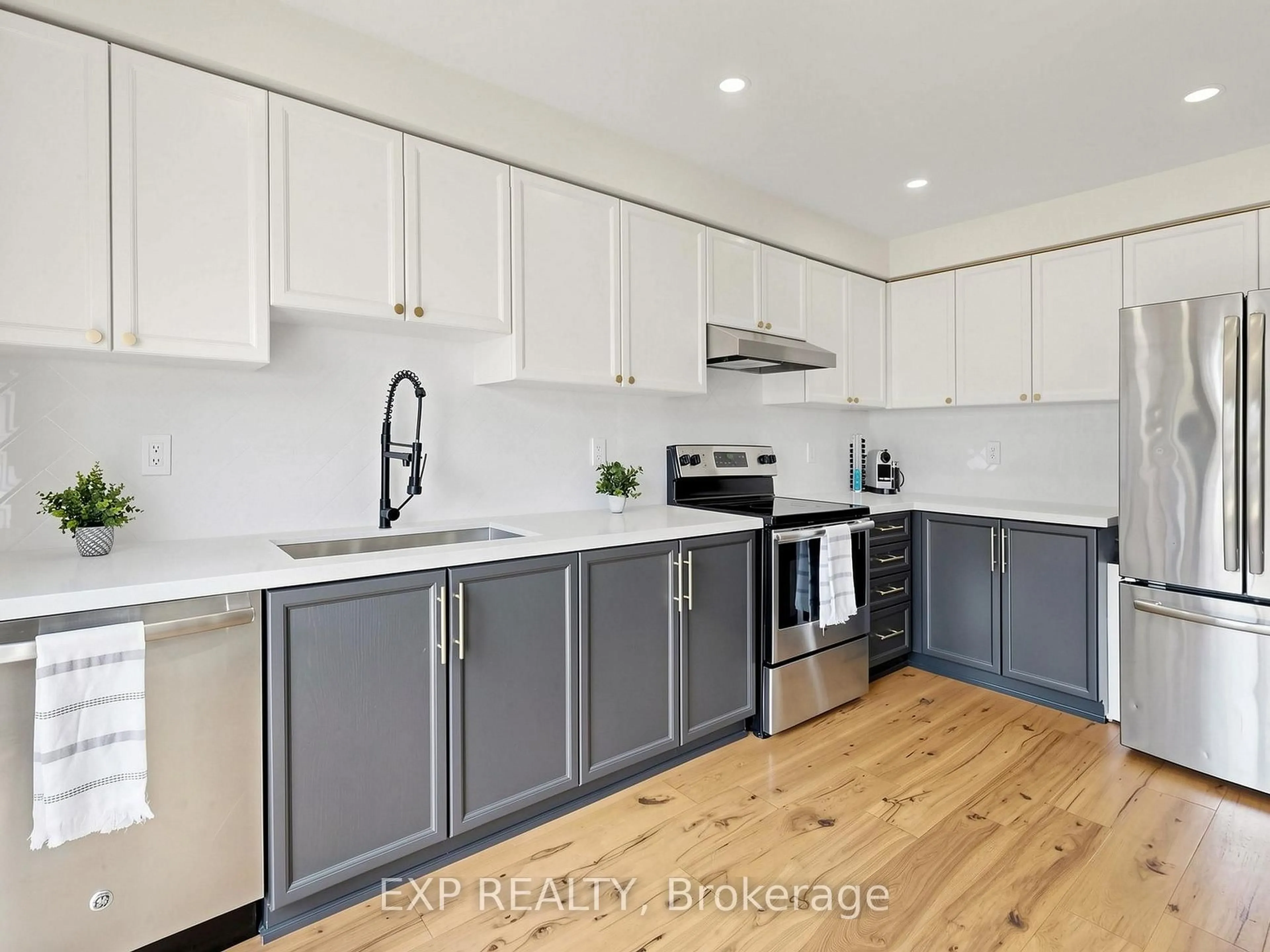 Open concept kitchen, wood/laminate floor for 101 Mccurdy Dr, New Tecumseth Ontario L0G 1W0