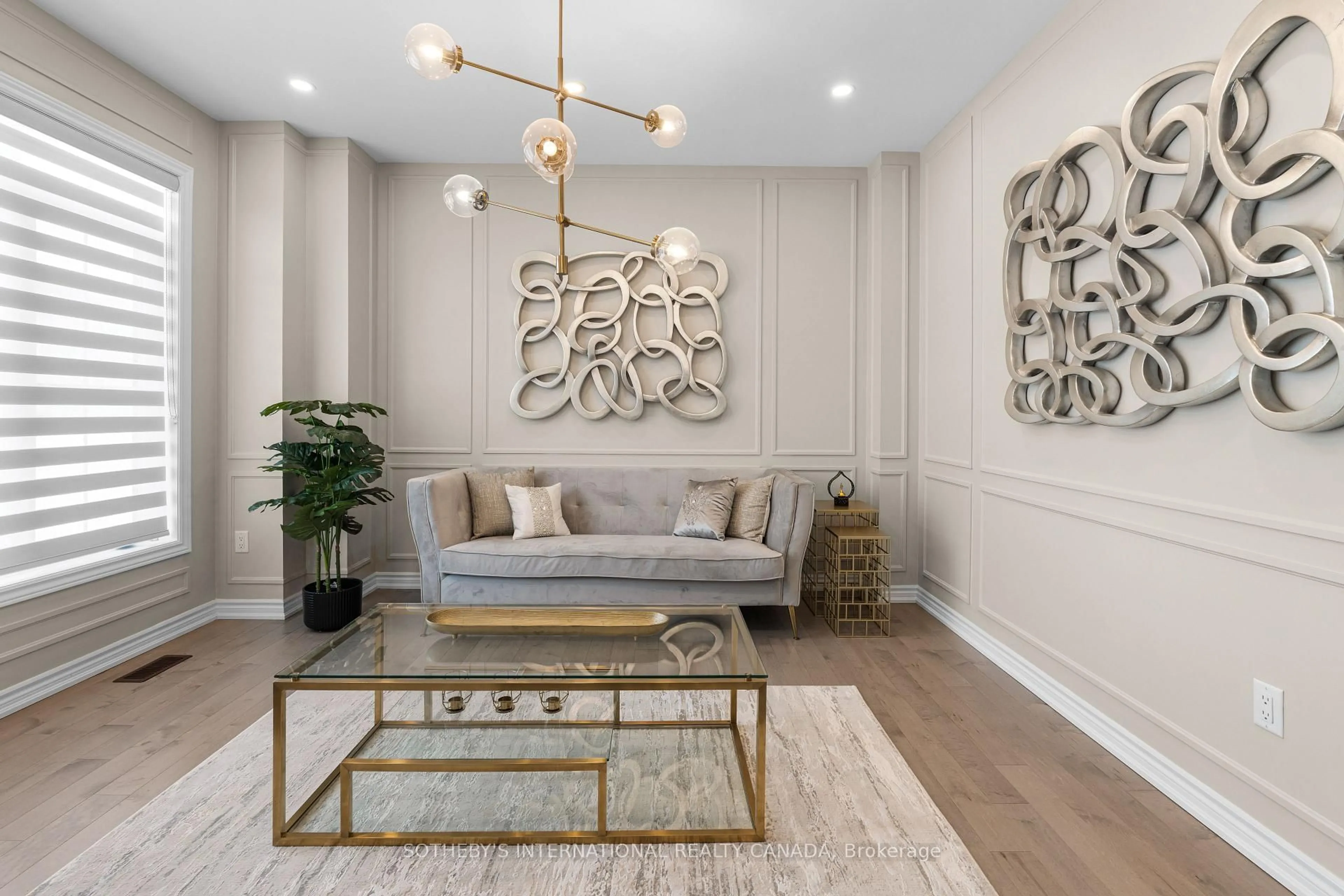 Living room with furniture, wood/laminate floor for 1633 Corsal Crt, Innisfil Ontario L9S 0J9