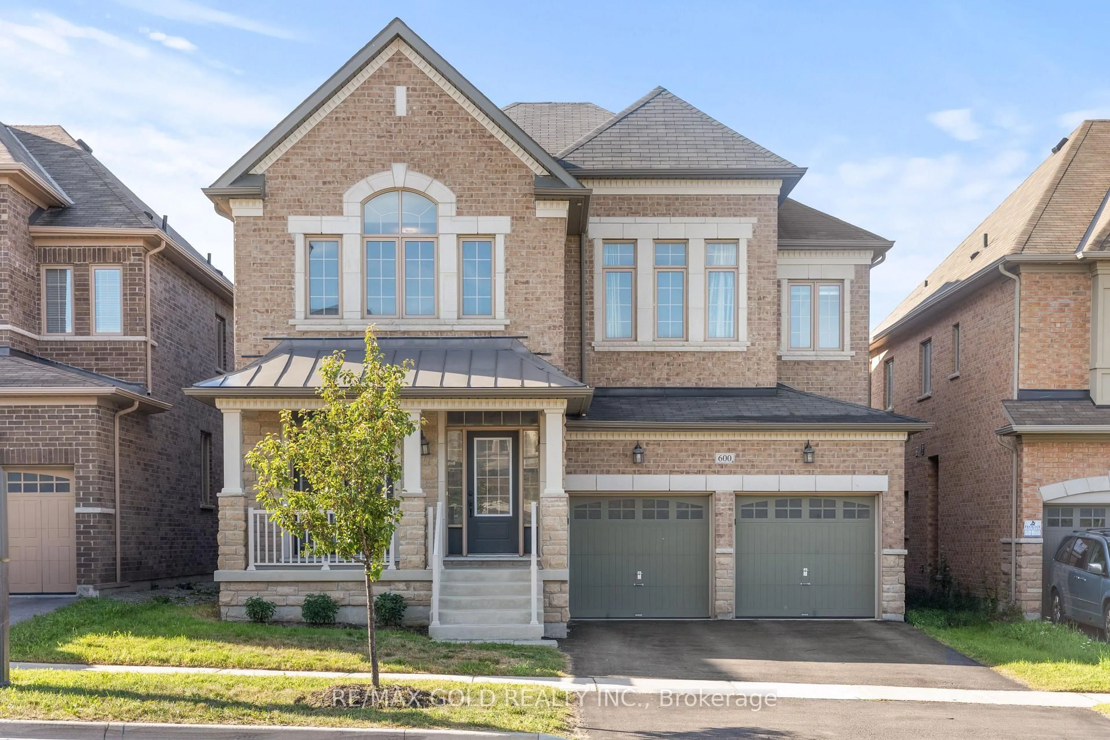 Home with brick exterior material, street for 600 Mactier Dr, Vaughan Ontario L4H 4T9