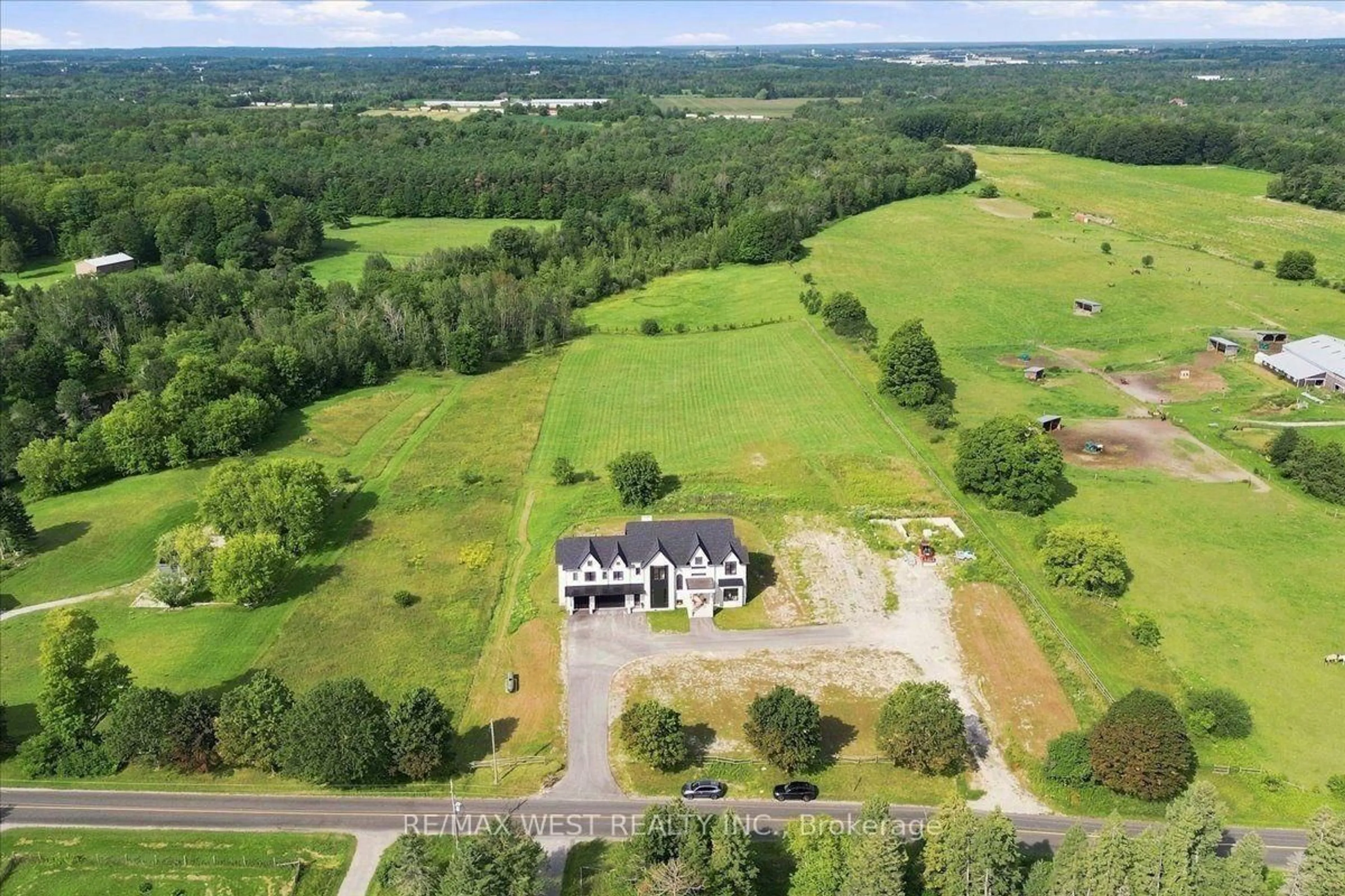 A pic from outside/outdoor area/front of a property/back of a property/a pic from drone, water/lake/river/ocean view for 17050 McCowan Rd, Whitchurch-Stouffville Ontario L4A 2A5