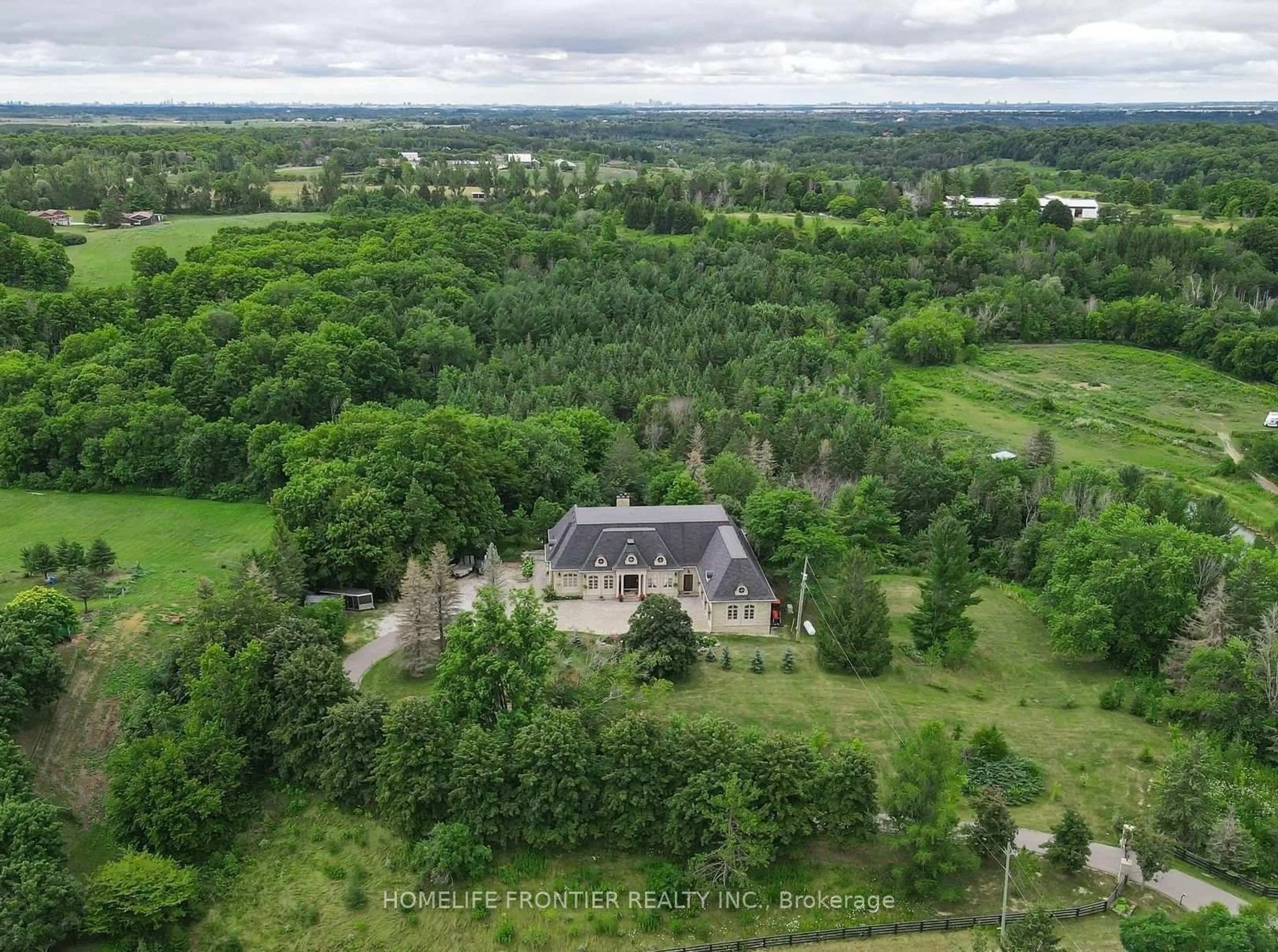 A pic from outside/outdoor area/front of a property/back of a property/a pic from drone, unknown for 7645 16th Sdrd, King Ontario L7E 5R7