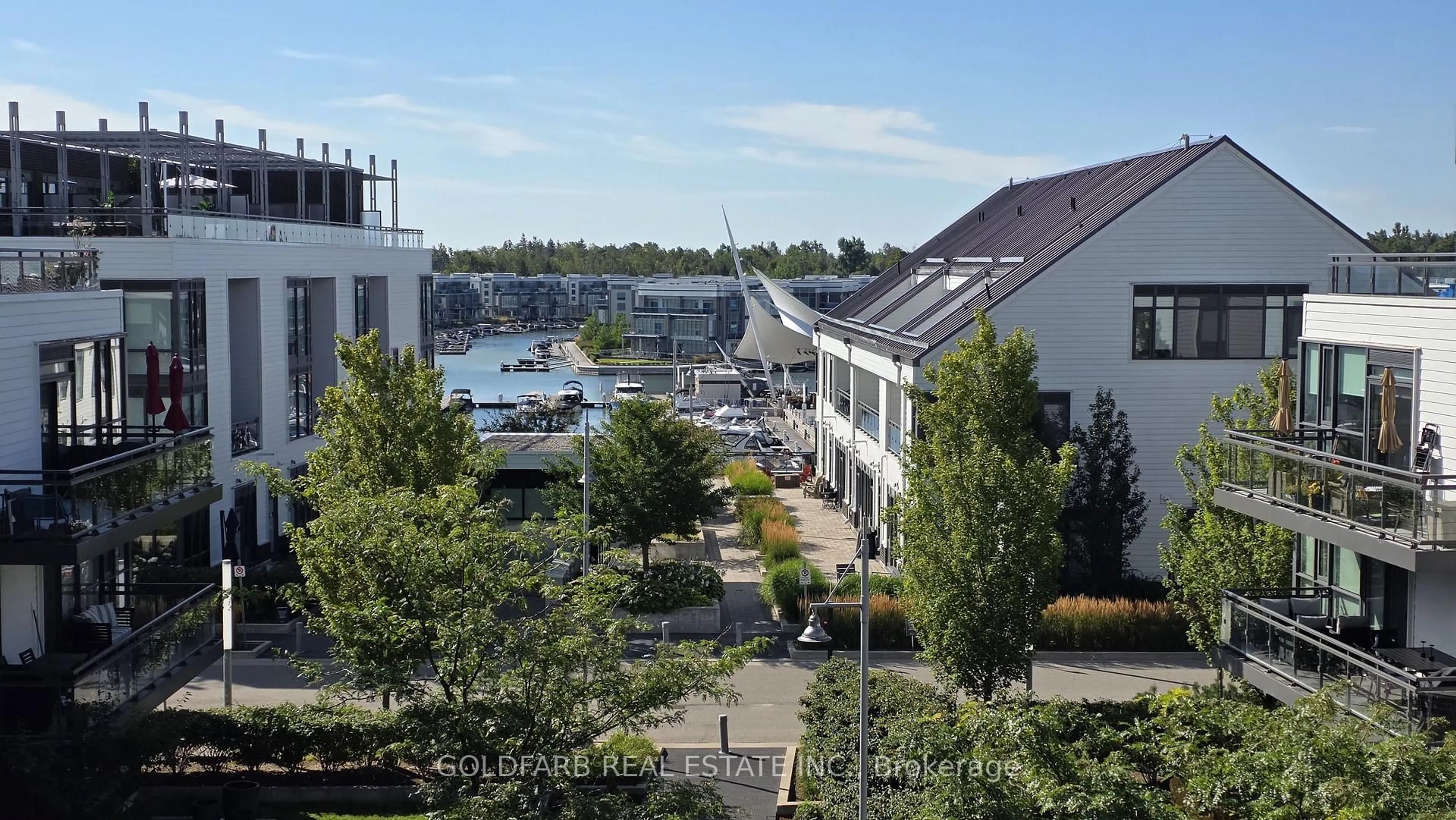 Patio, city buildings view from balcony for 271 Sea Ray Ave #B401, Innisfil Ontario L9S 0J4