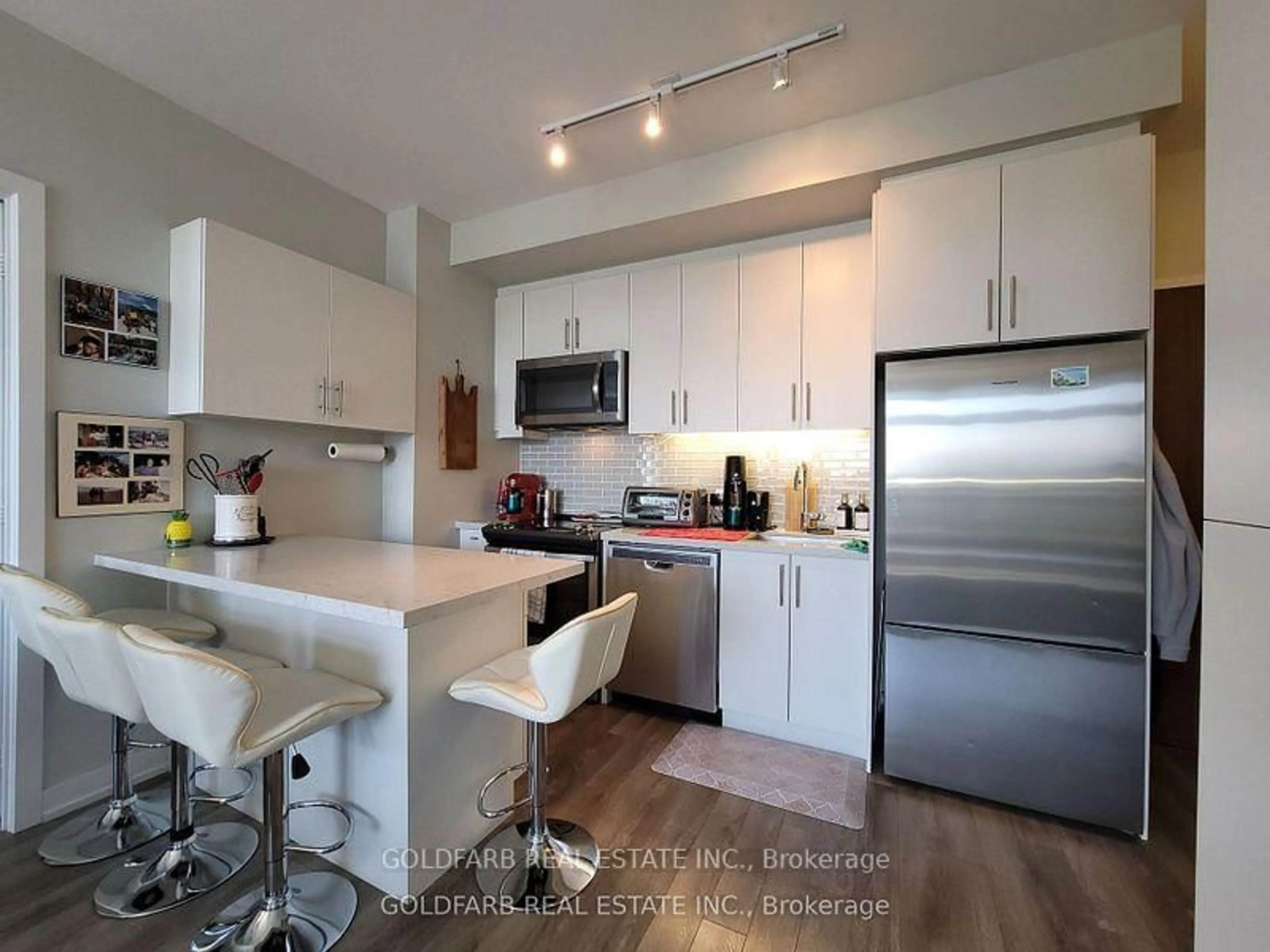 Open concept kitchen, unknown for 271 Sea Ray Ave #B401, Innisfil Ontario L9S 0J4