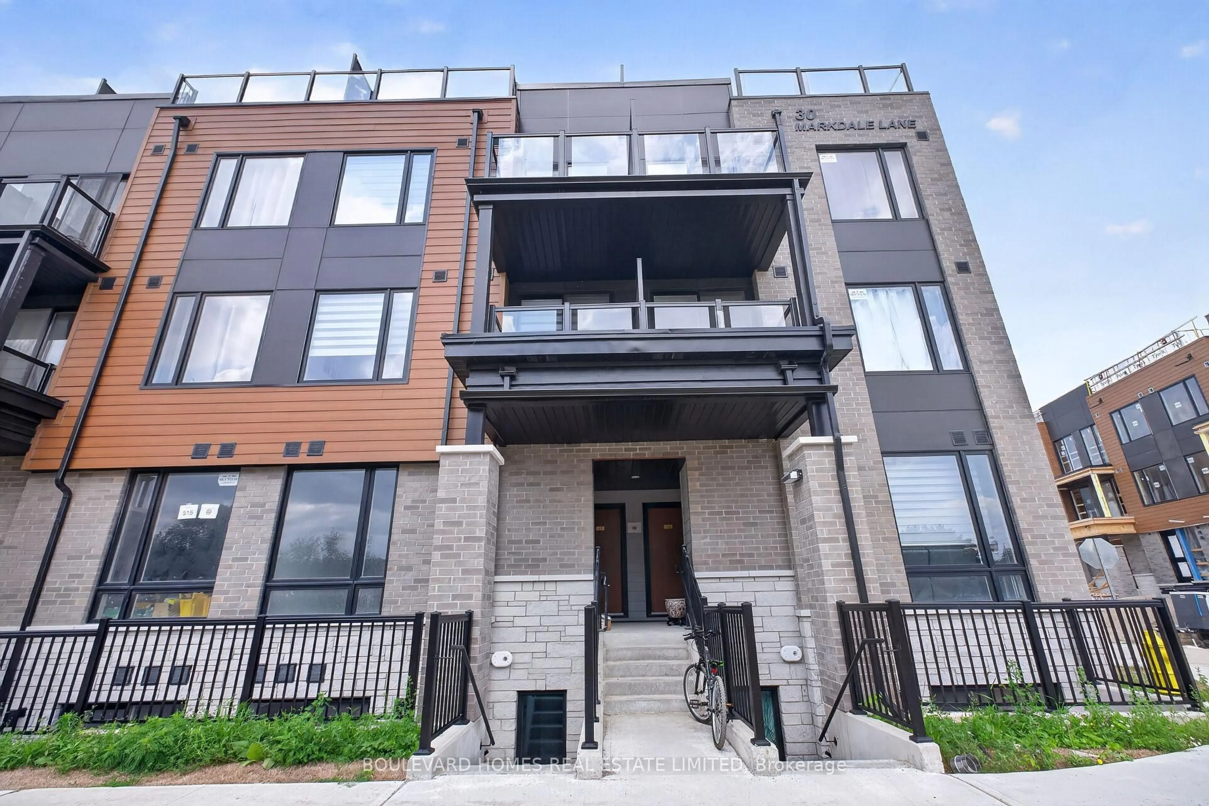 Home with brick exterior material, building for 30 Markdale Lane #13, Markham Ontario L3S 0E3