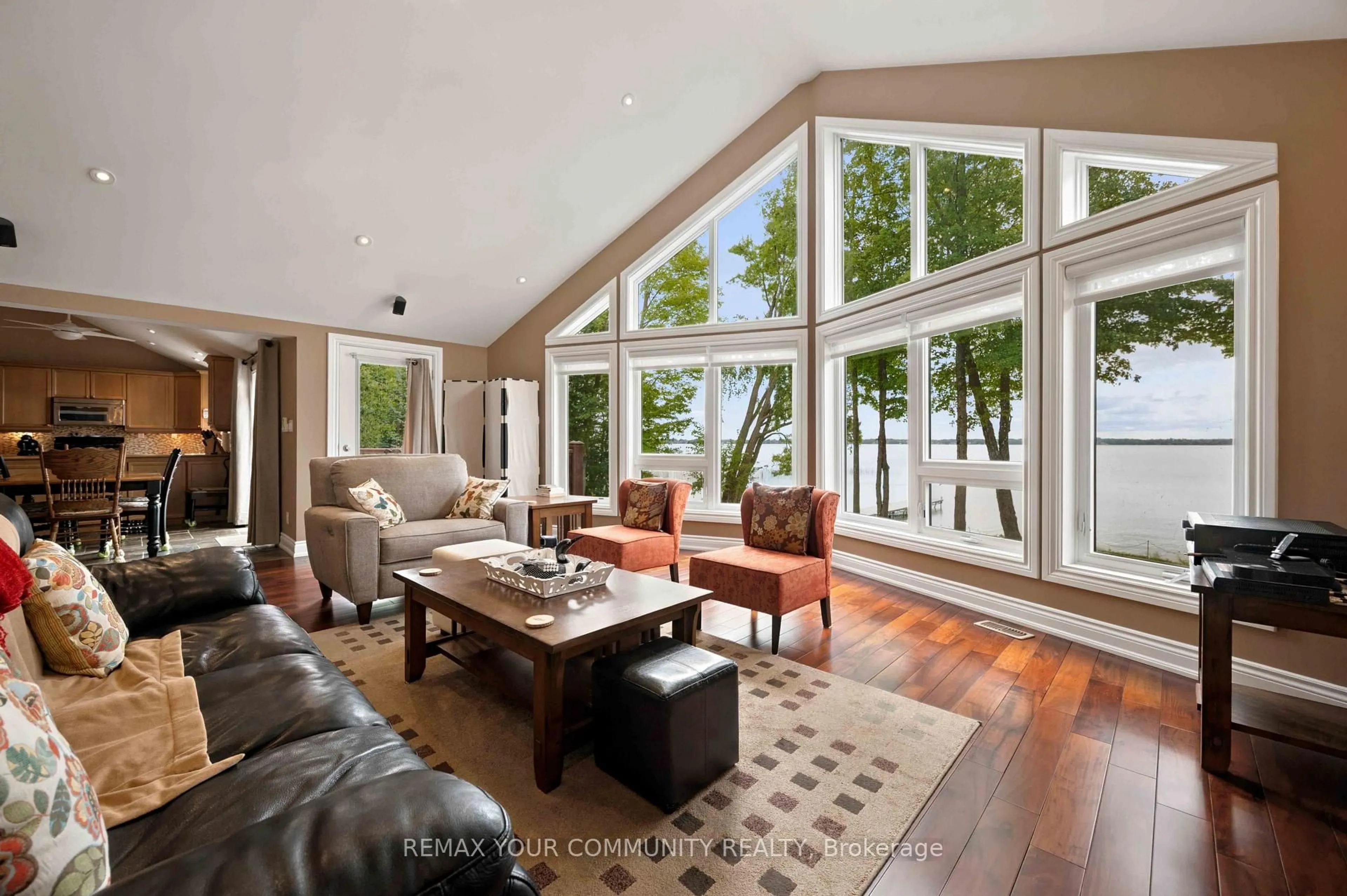 Living room with furniture, wood/laminate floor for 386 Bear Rd, Georgina Islands Ontario L0E 1R0