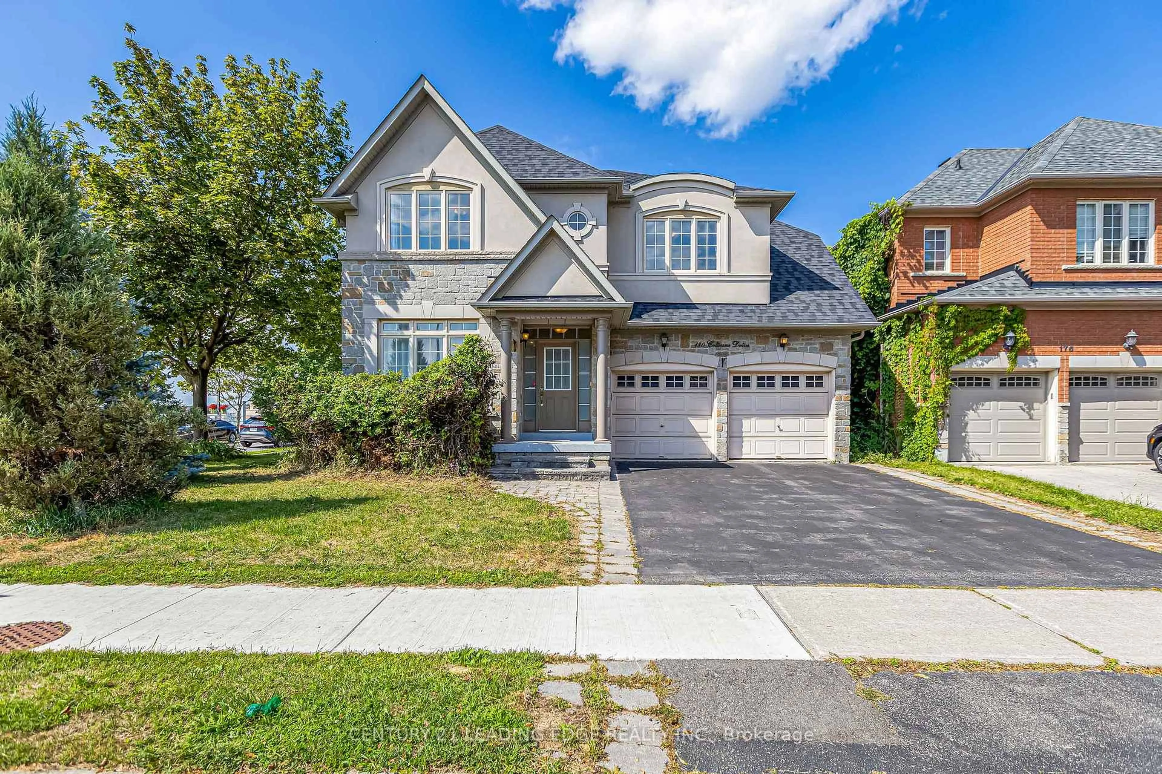 Home with brick exterior material, street for 180 Coltrane Dr, Vaughan Ontario L4J 9B4