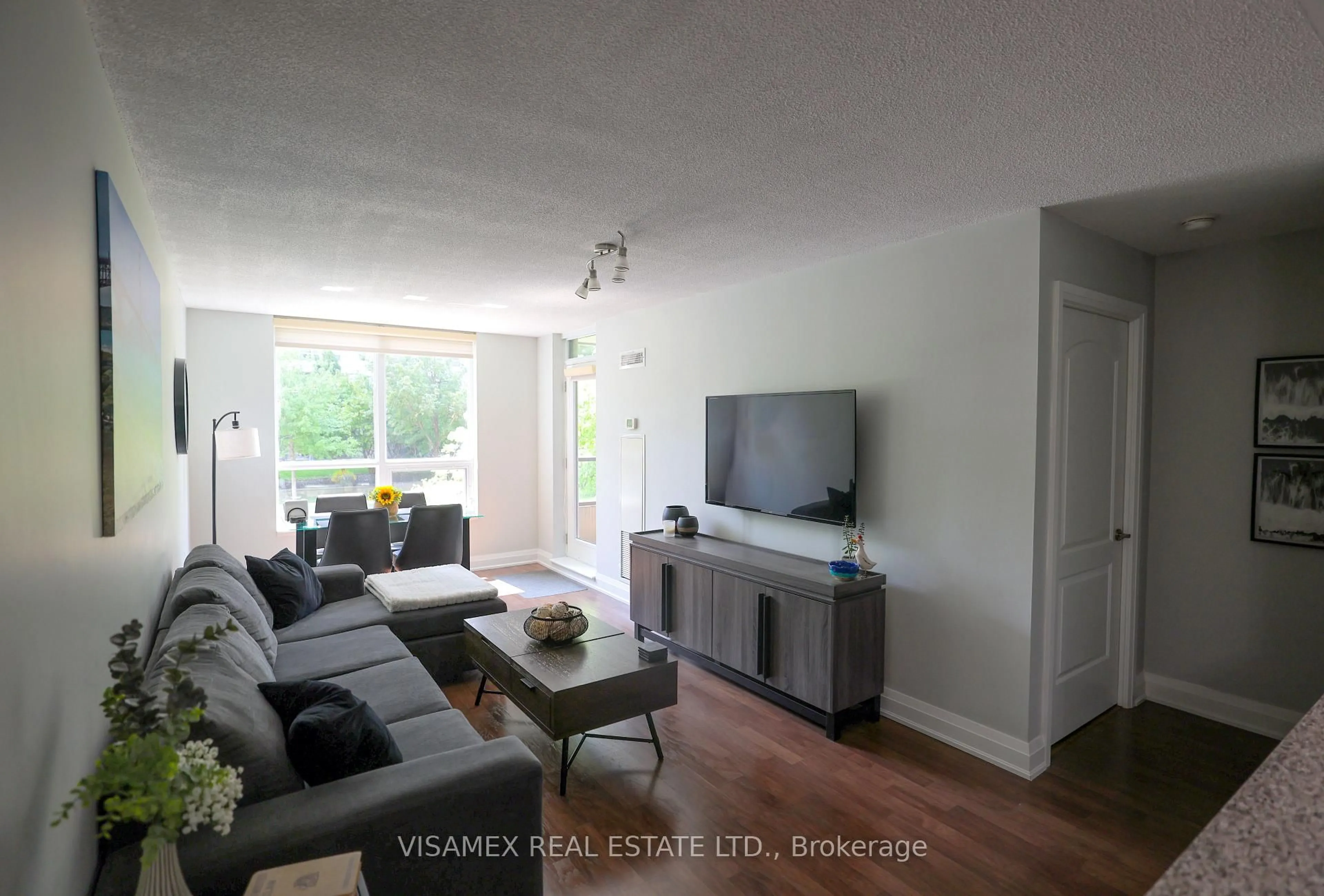 Living room with furniture, unknown for 20 North Park Rd #210, Vaughan Ontario L4J 0G7