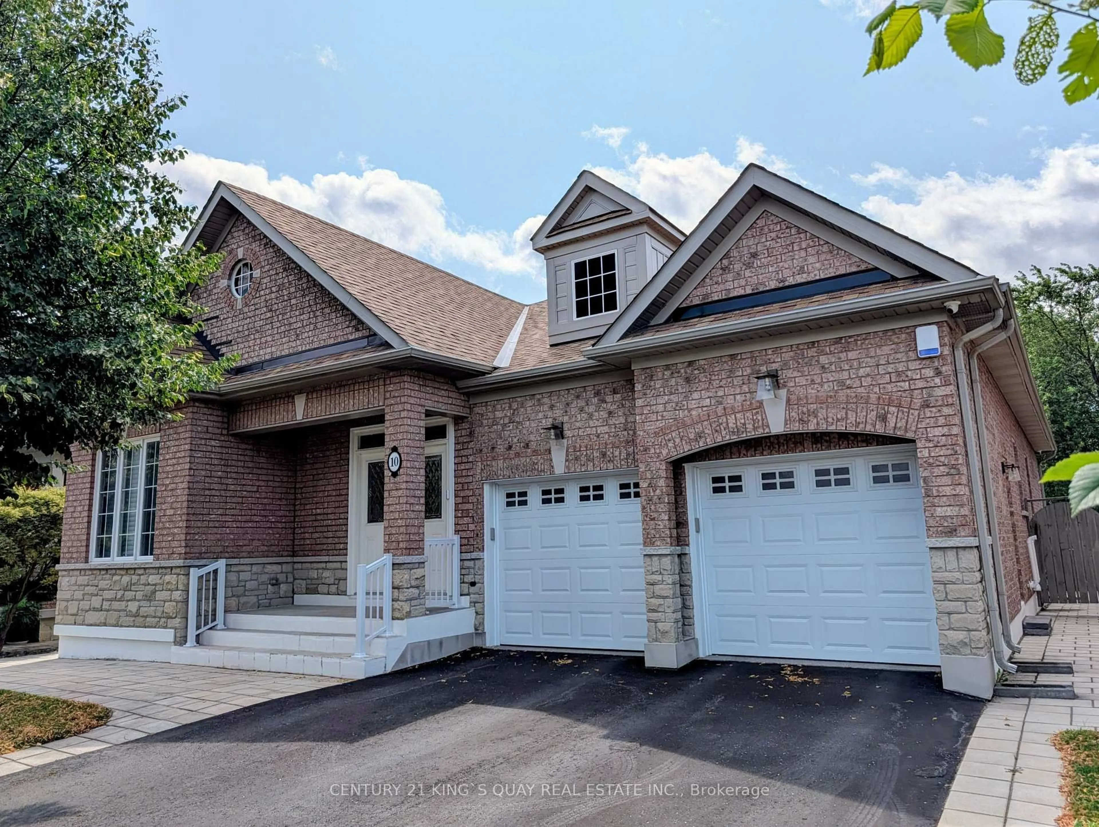 Home with brick exterior material, street for 10 Coakwell Dr, Markham Ontario L6B 0L7