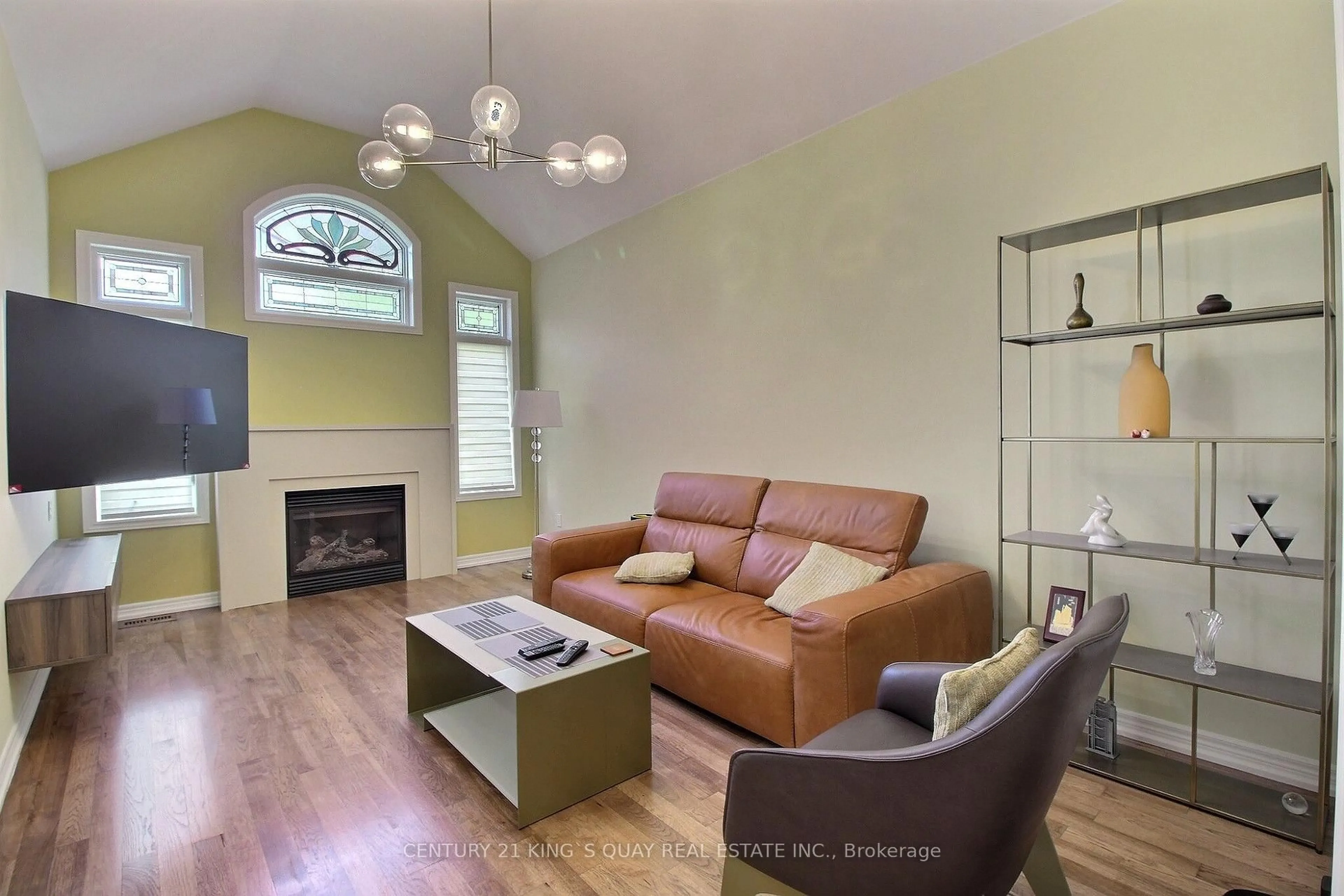 Living room with furniture, wood/laminate floor for 10 Coakwell Dr, Markham Ontario L6B 0L7