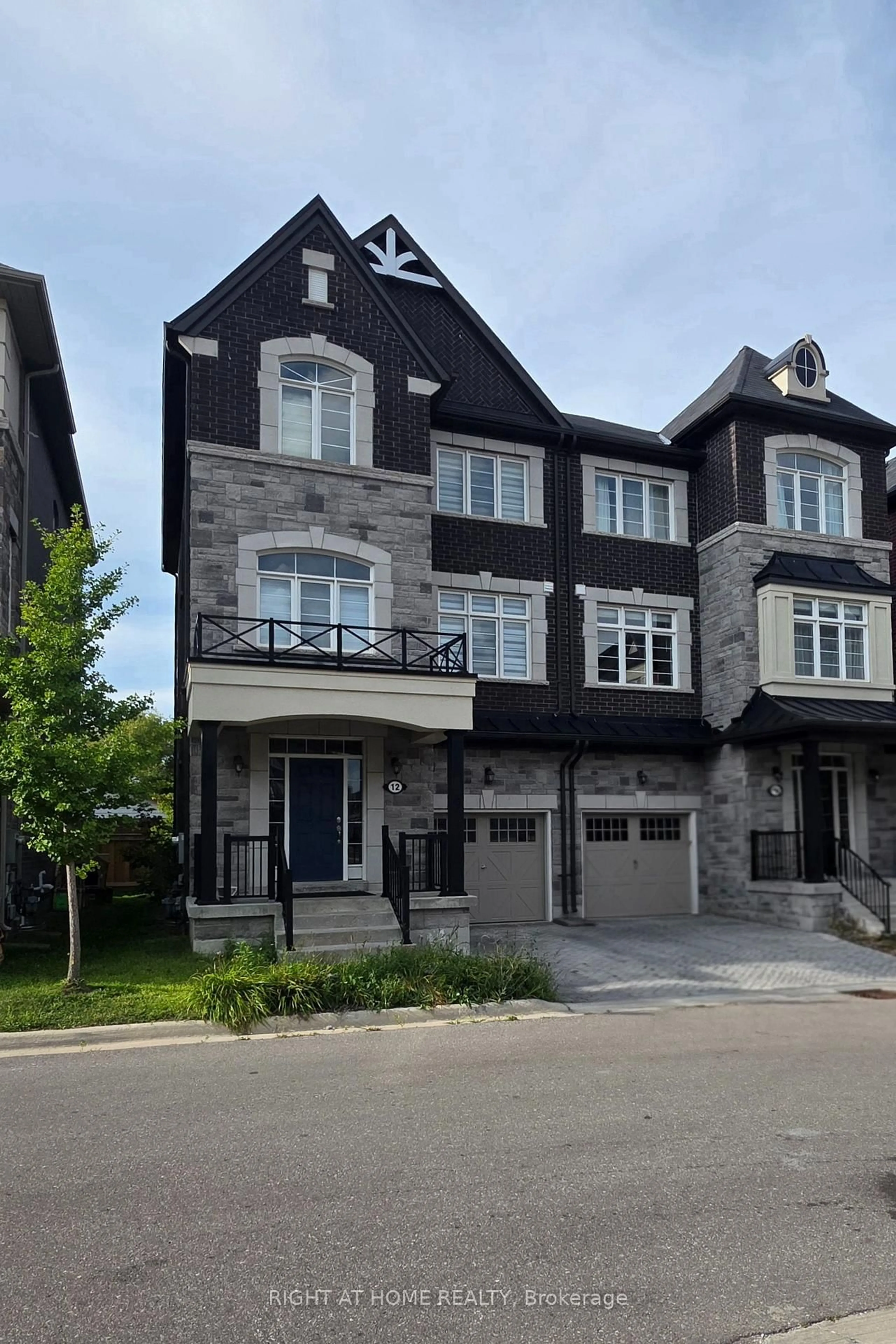 Home with brick exterior material, street for 12 Globemaster Lane, Richmond Hill Ontario L4E 1H3
