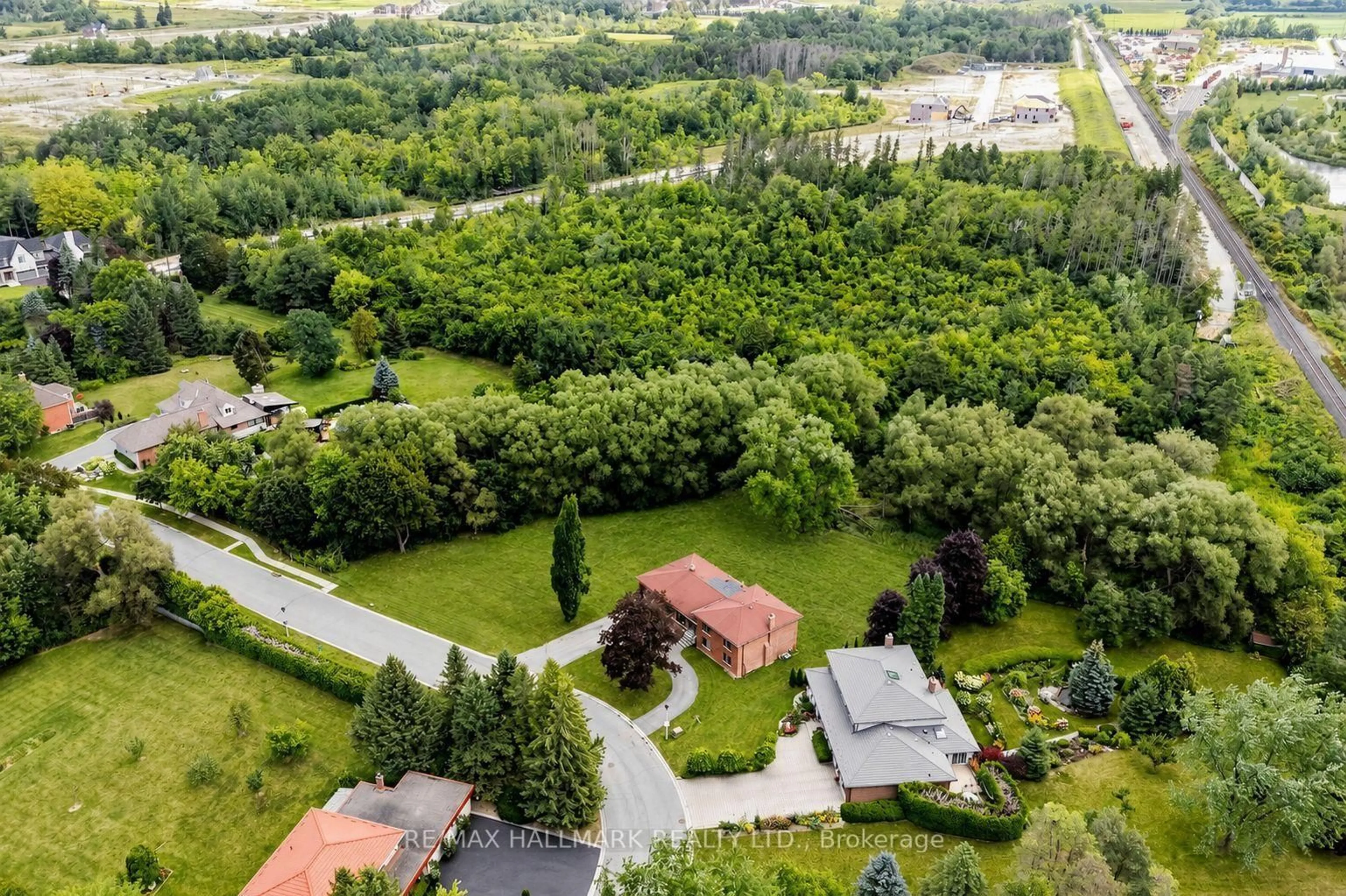 A pic from outside/outdoor area/front of a property/back of a property/a pic from drone, forest/trees view for 155 Dennison St, King Ontario L7B 1B8