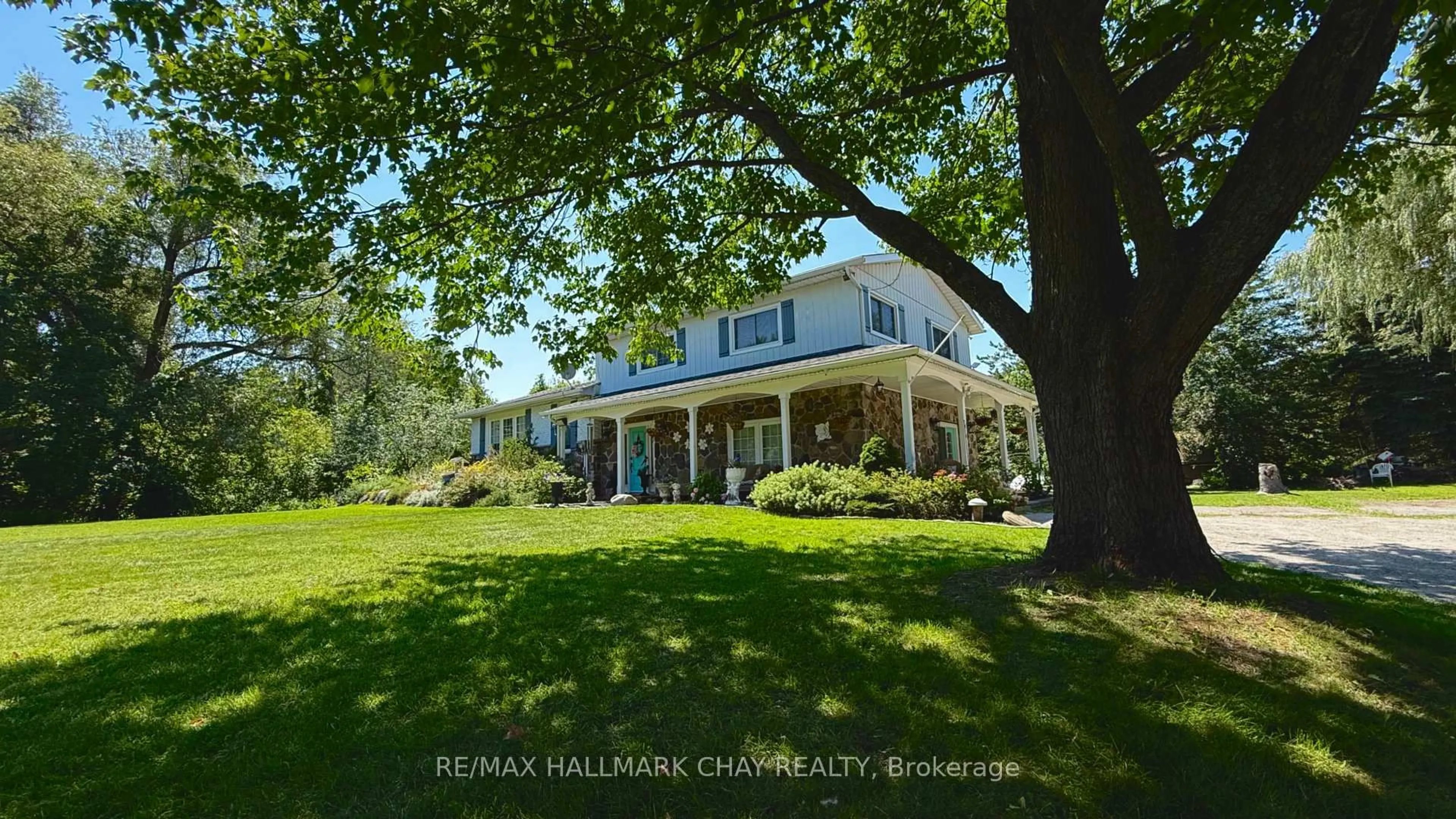 A pic from outside/outdoor area/front of a property/back of a property/a pic from drone, water/lake/river/ocean view for 2230 Spring St, Innisfil Ontario L9S 2B6