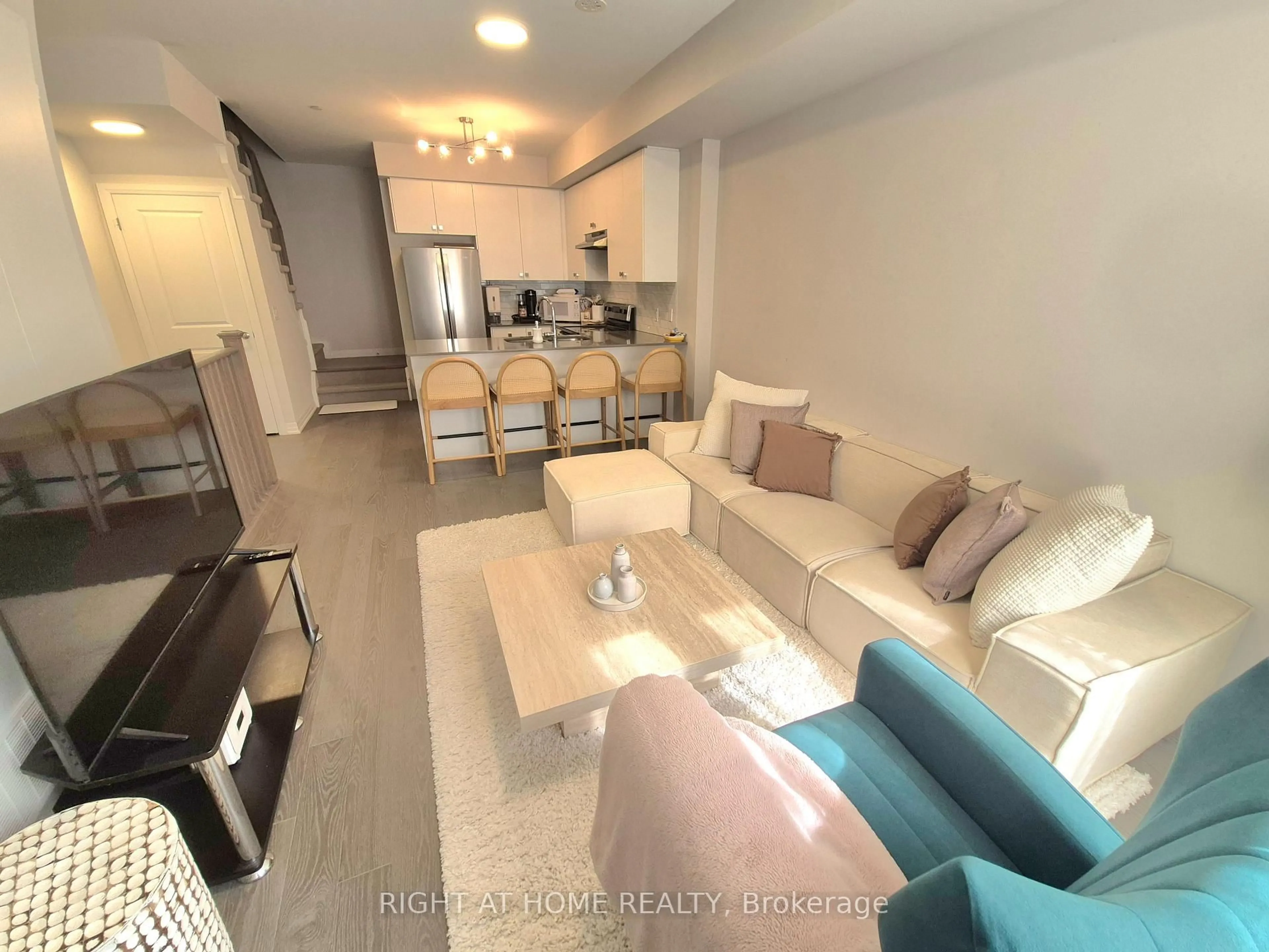 Living room with furniture, unknown for 70 Baynes Way #12, Bradford West Gwillimbury Ontario L3Z 4M3