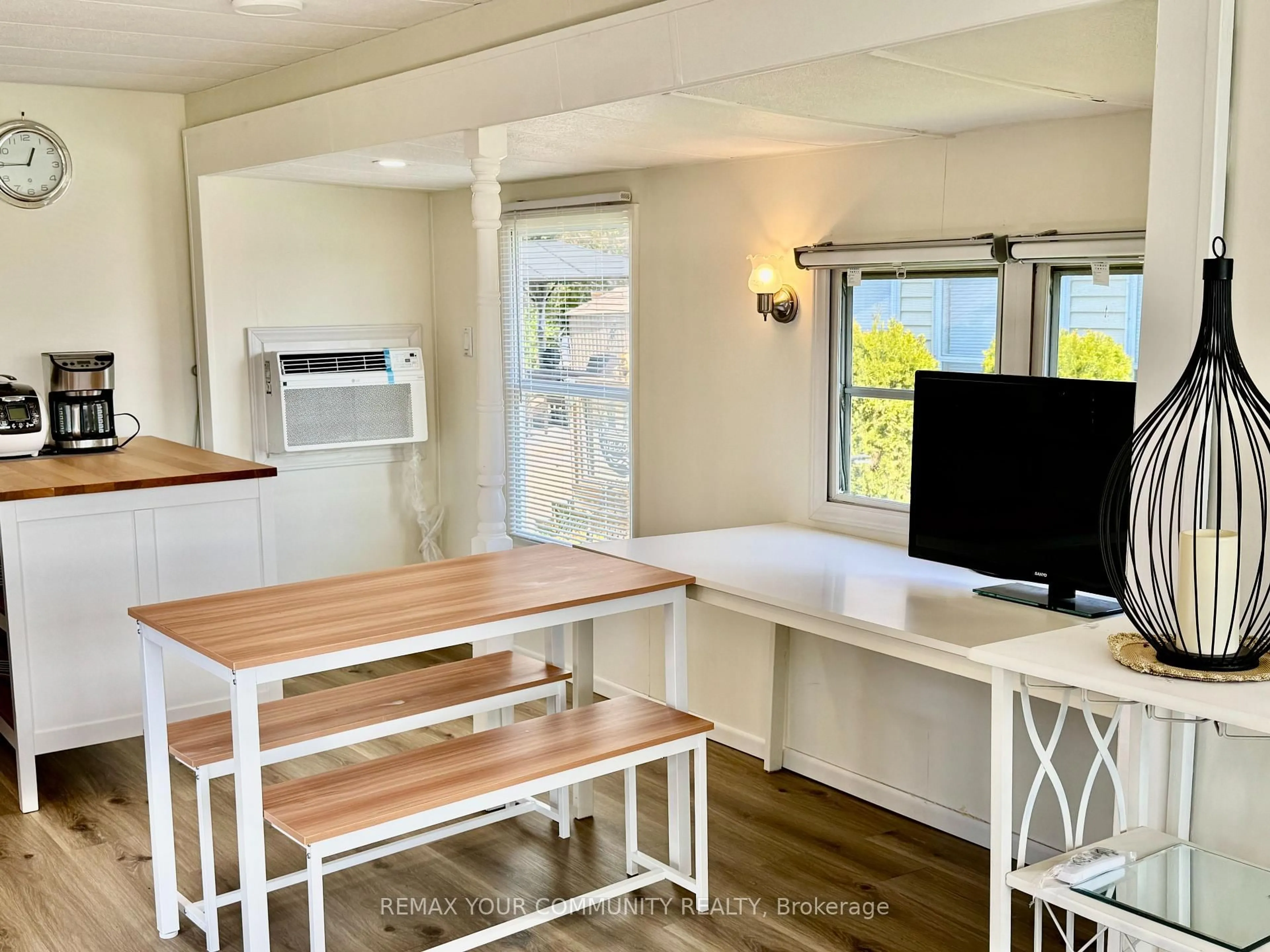 Open concept kitchen, wood/laminate floor for 285 Crydermans Sdrd #237, Georgina Ontario L0E 1A0
