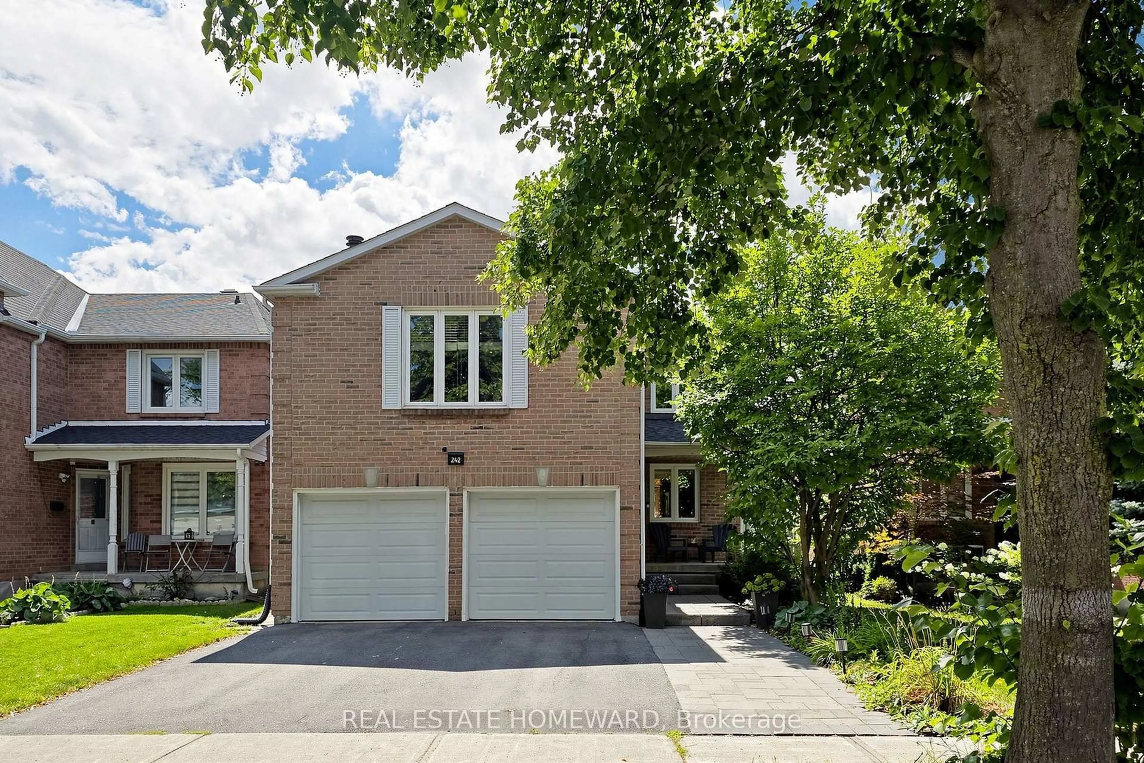 Home with brick exterior material, street for 242 Badessa Circ, Vaughan Ontario L4J 6C7