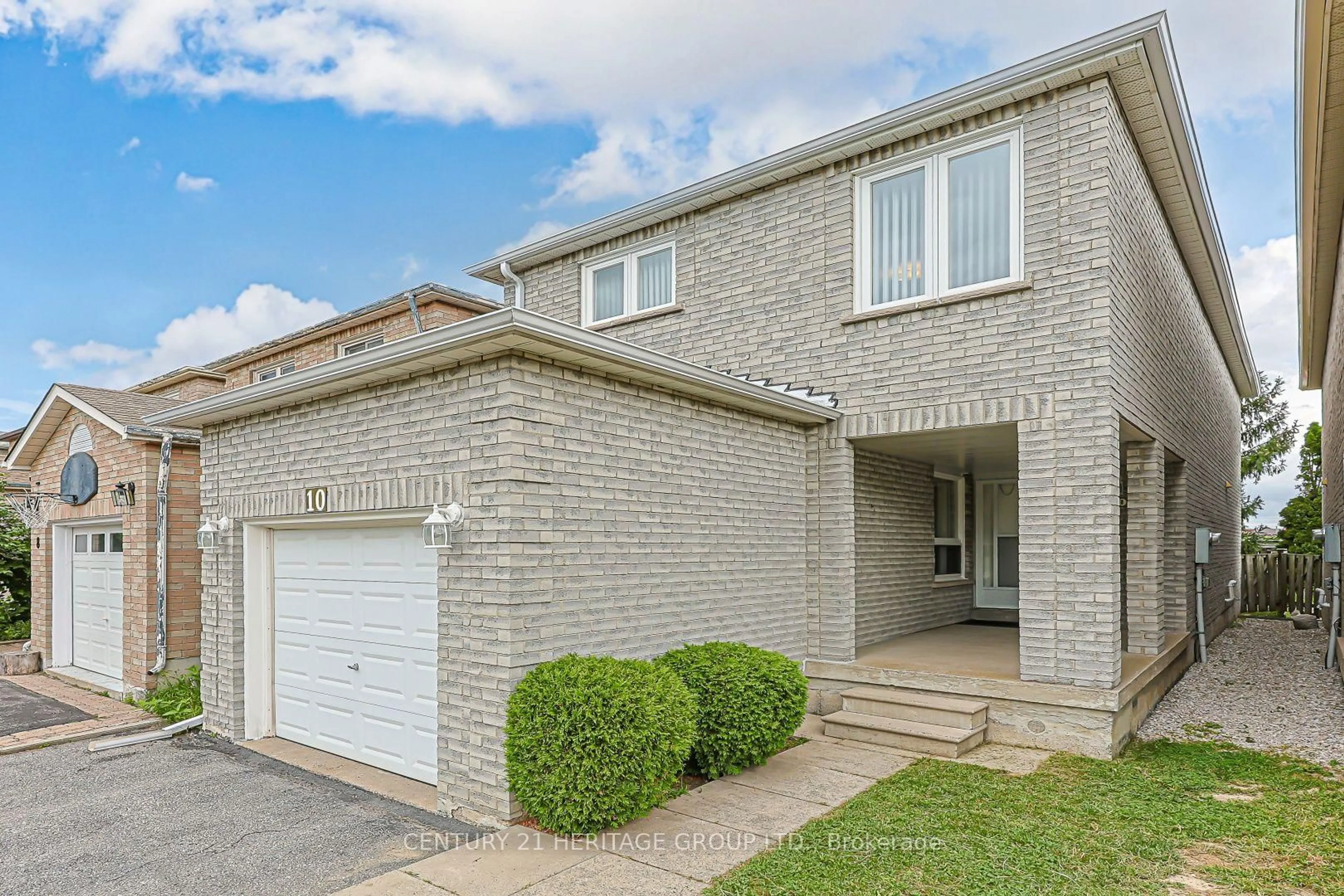 Home with brick exterior material, street for 10 Woodhall Rd, Markham Ontario L3S 1N9