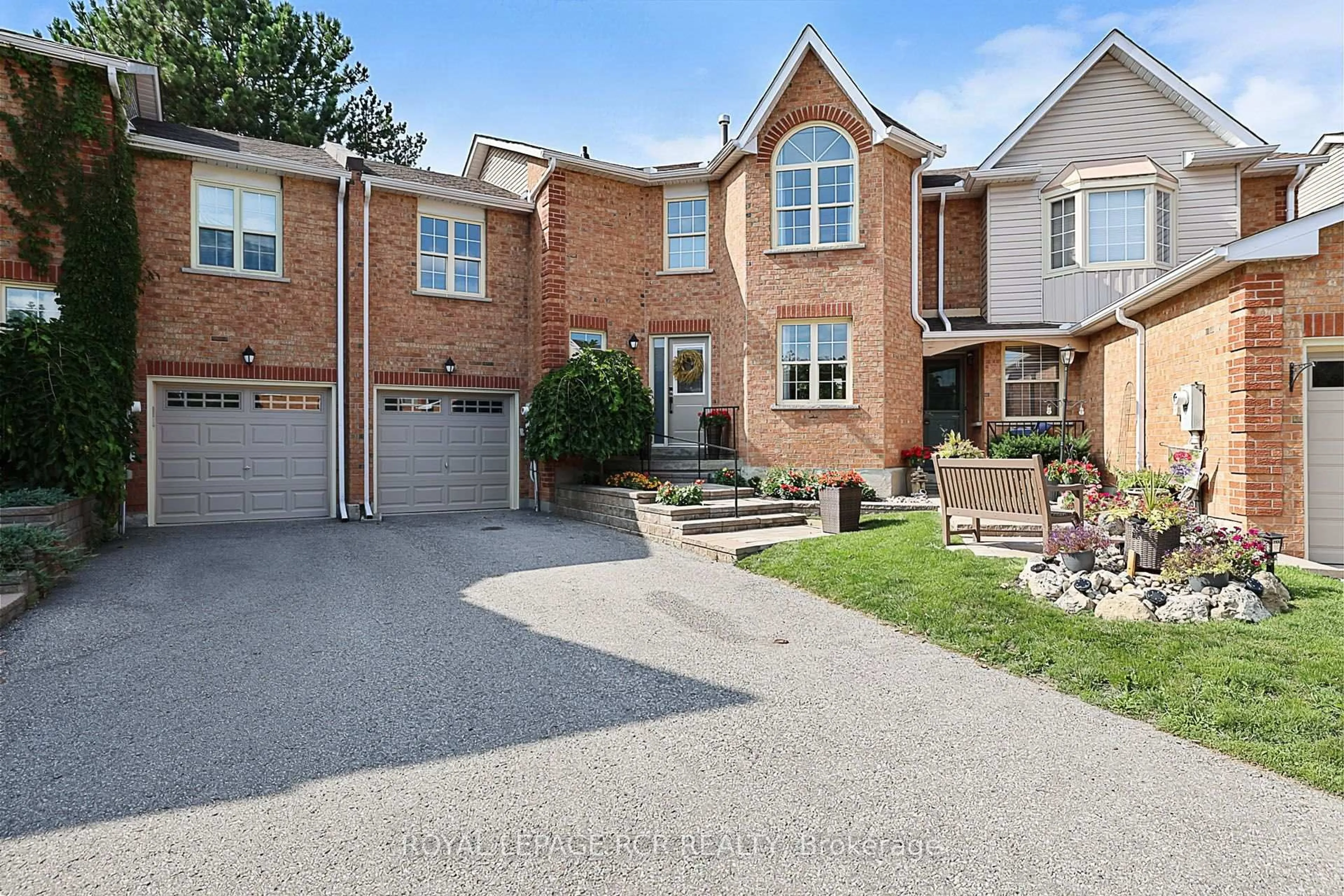 Home with brick exterior material, street for 411 Butler Crt, Aurora Ontario L4G 6G8