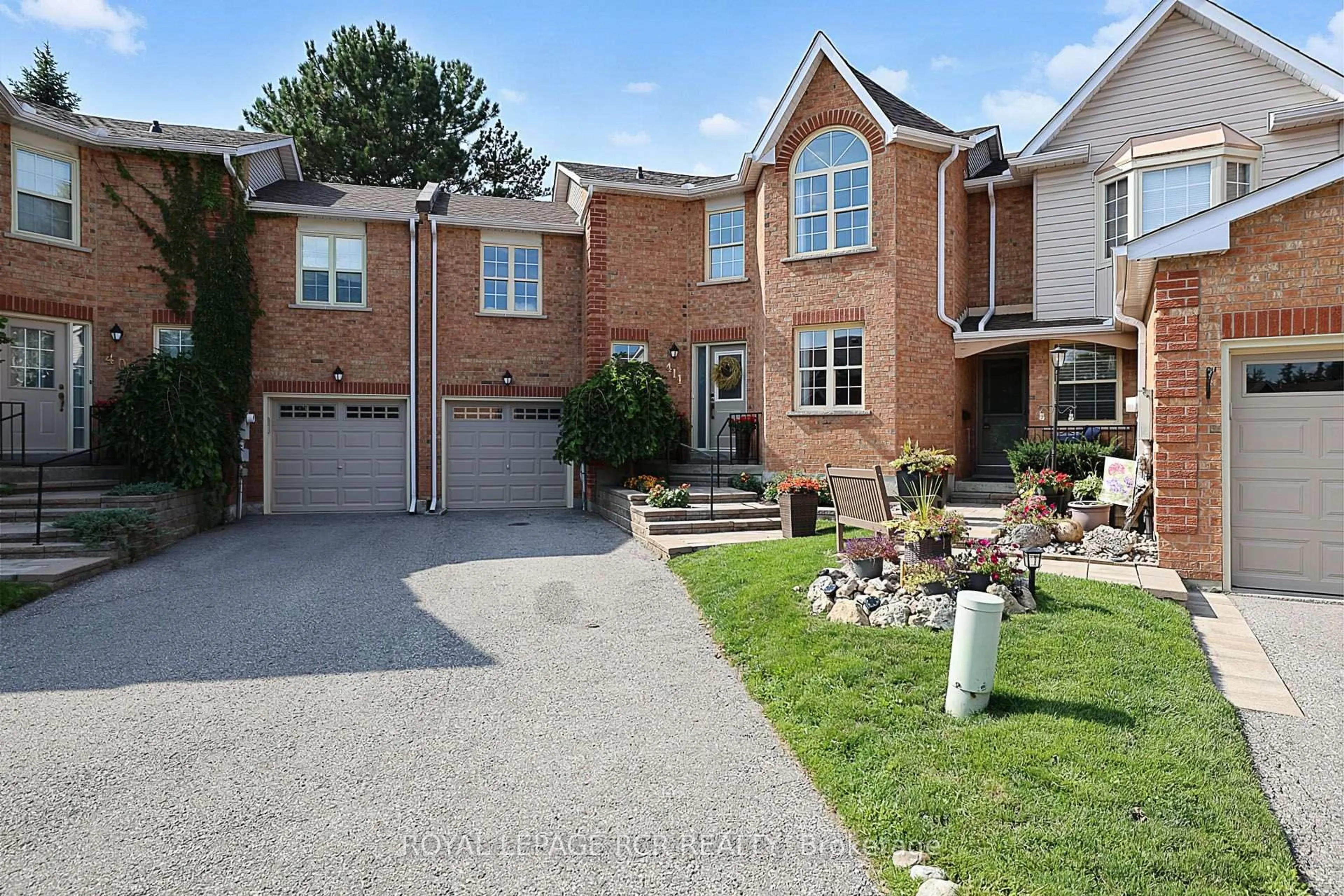 Home with brick exterior material, street for 411 Butler Crt, Aurora Ontario L4G 6G8