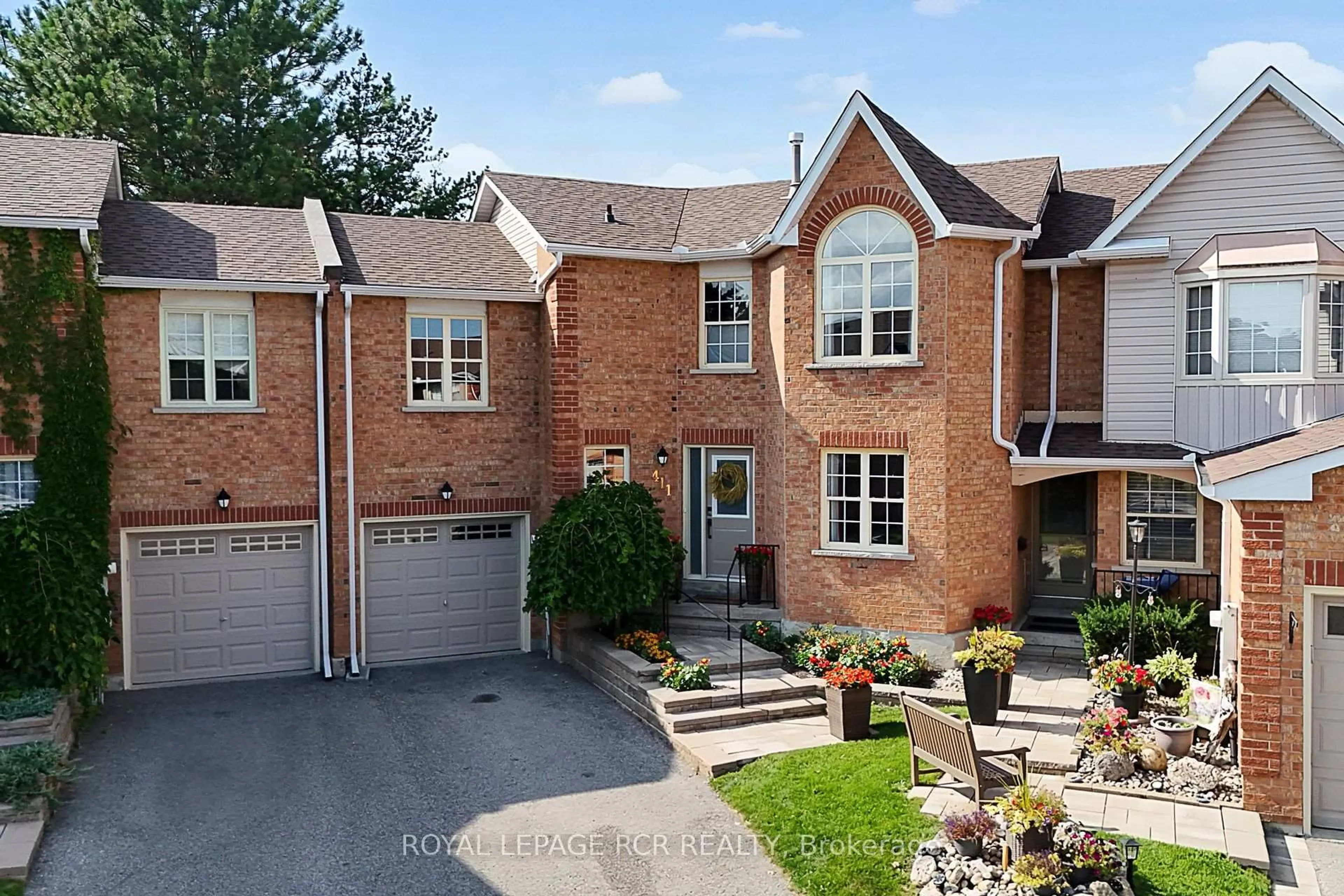 Home with brick exterior material, street for 411 Butler Crt, Aurora Ontario L4G 6G8