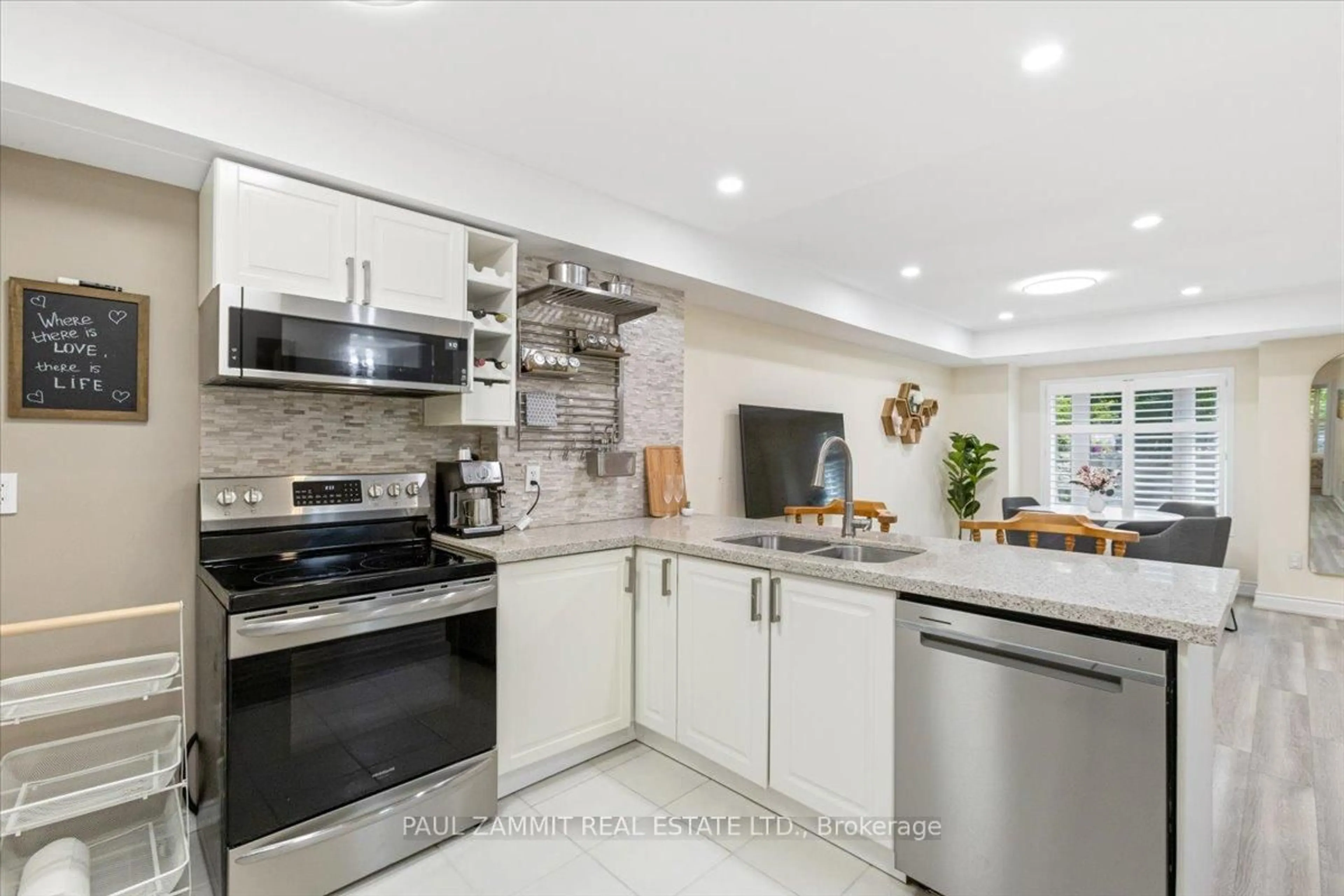 Open concept kitchen, ceramic/tile floor for 310 John St #169, Markham Ontario L3T 0A7