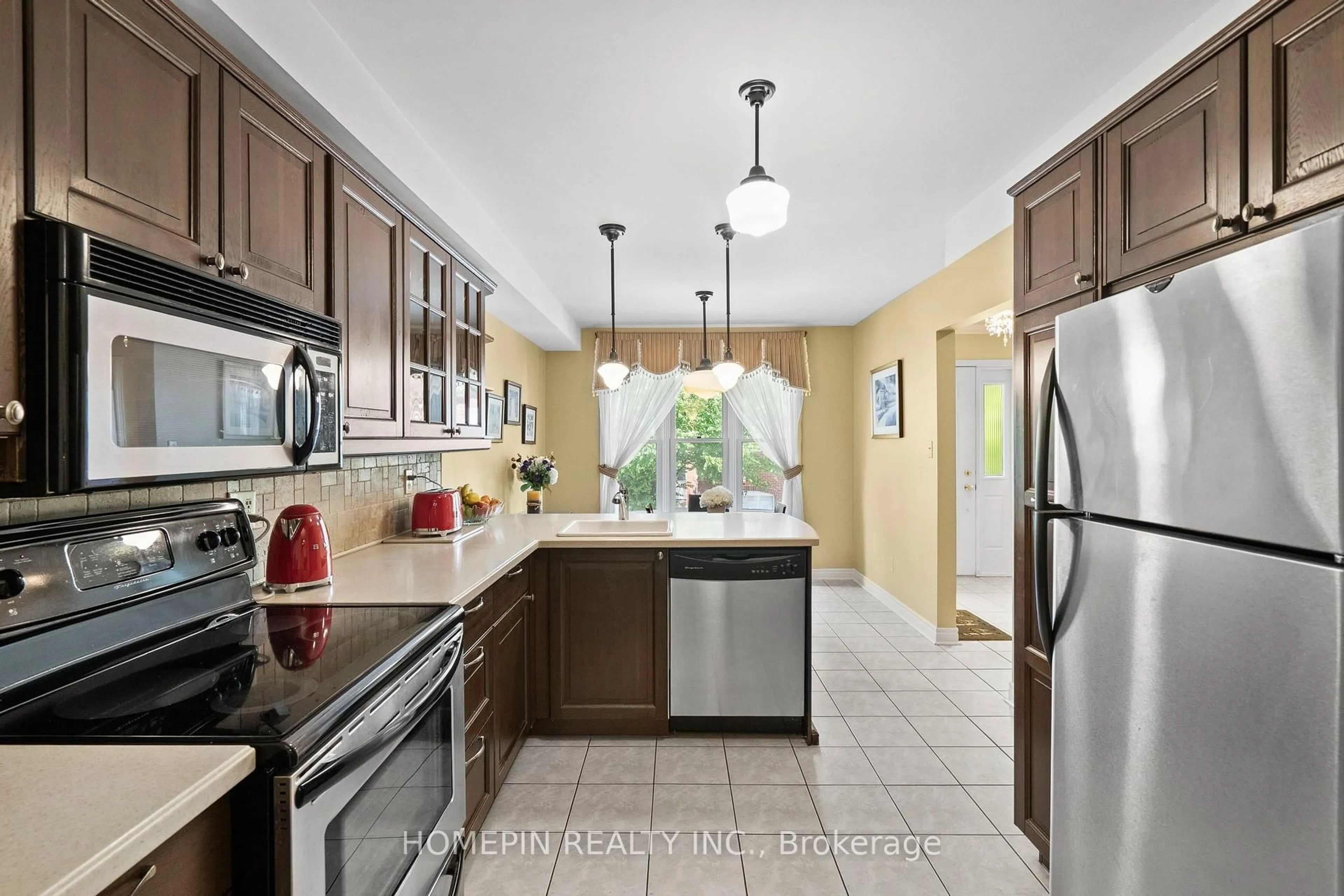 Standard kitchen, ceramic/tile floor for 84 Confederation Way, Markham Ontario L3T 5R5