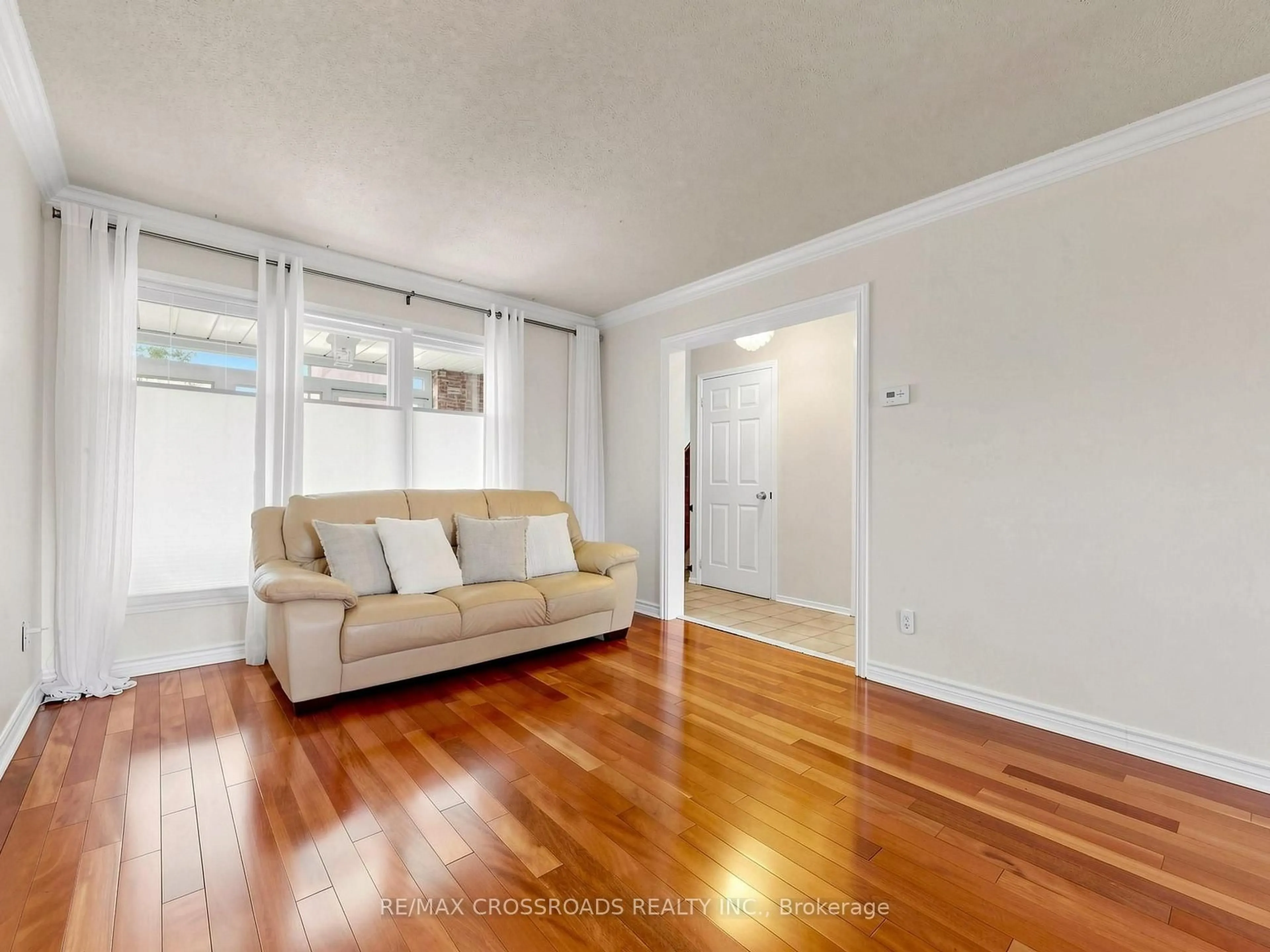 Living room with furniture, wood/laminate floor for 108 Anthony Lane, Vaughan Ontario L4K 3K8