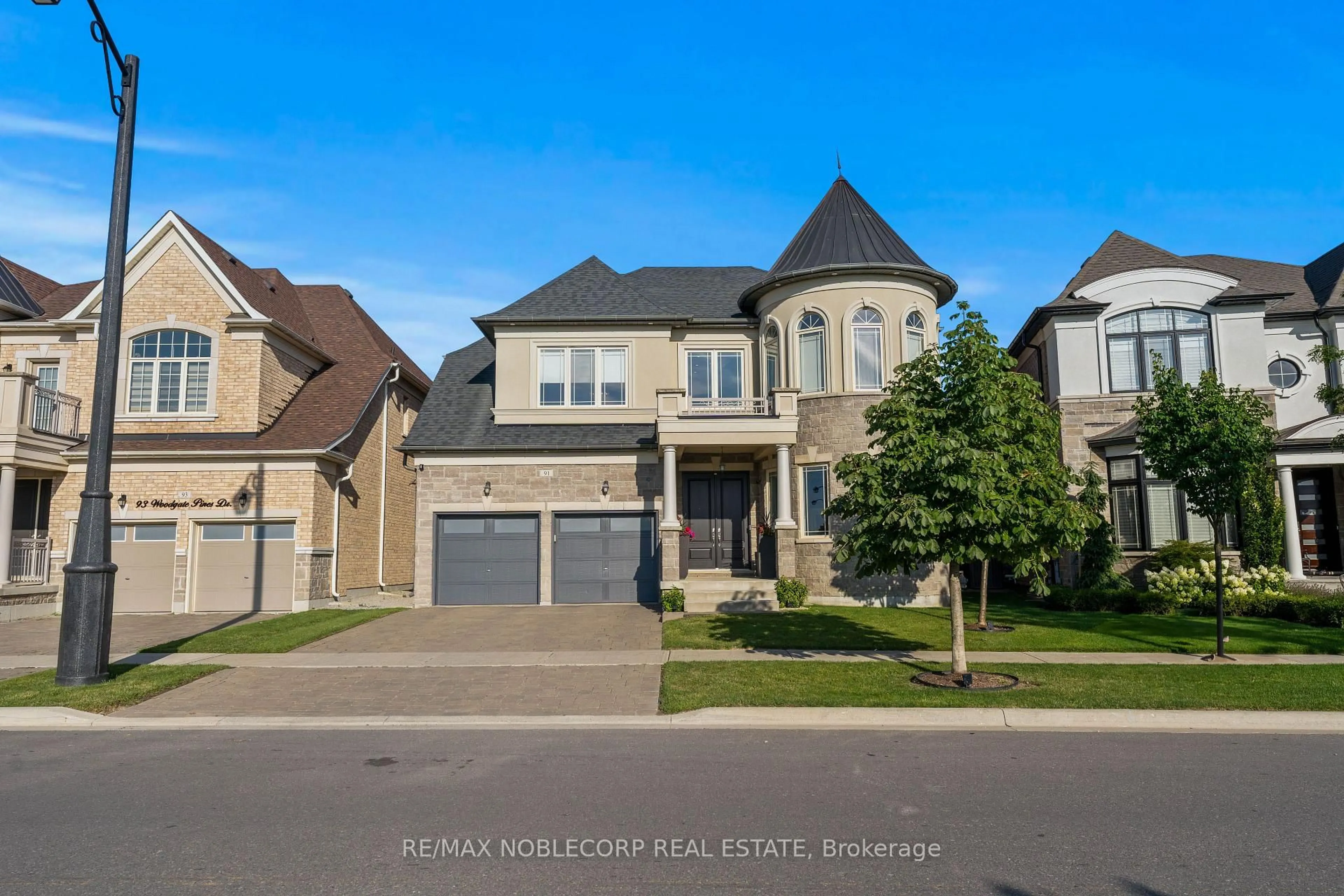 Home with brick exterior material, street for 91 Woodgate Pines Dr, Vaughan Ontario L4H 4A4