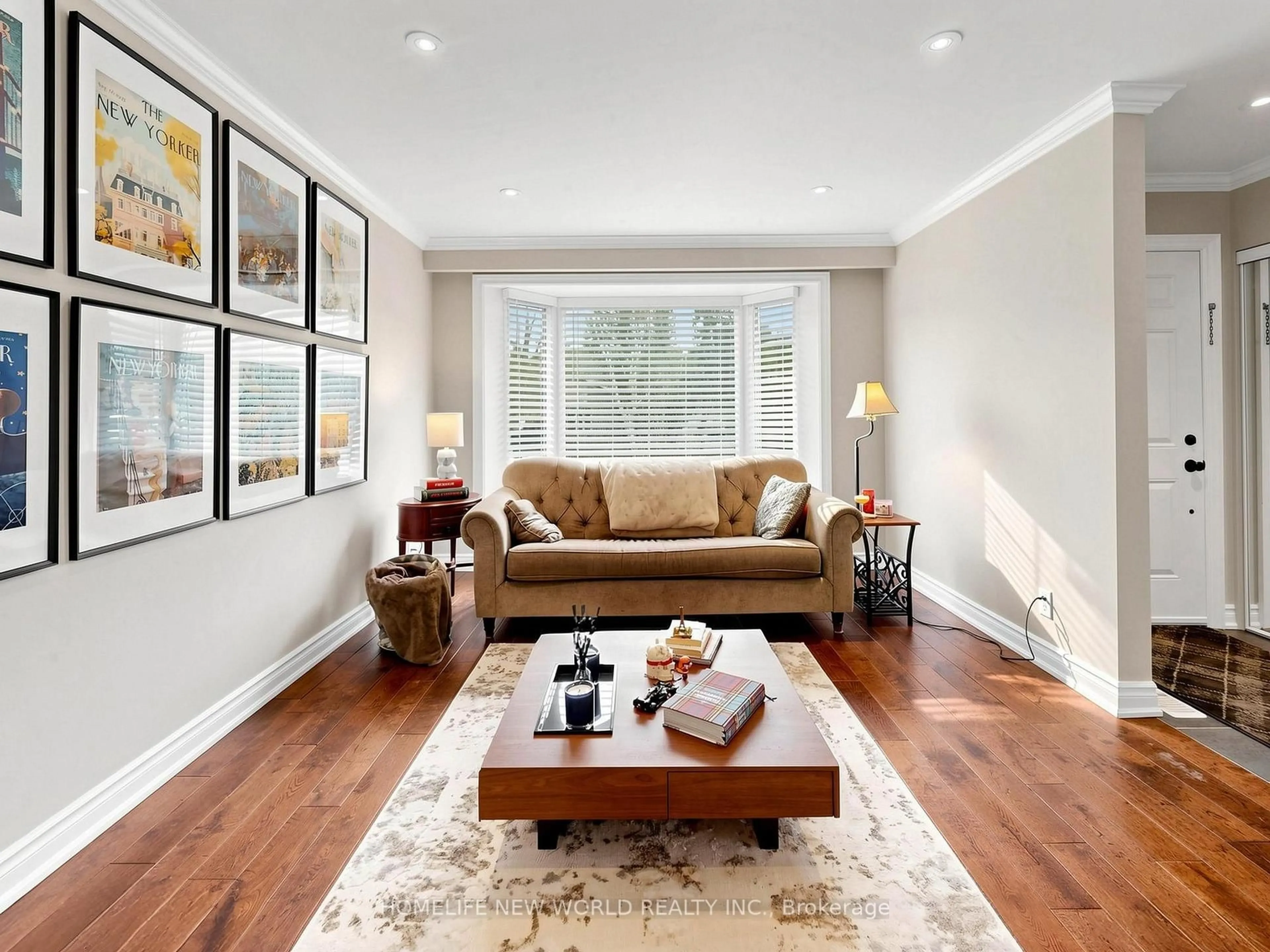 Living room with furniture, wood/laminate floor for 74 Child Dr, Aurora Ontario L4G 1Y7