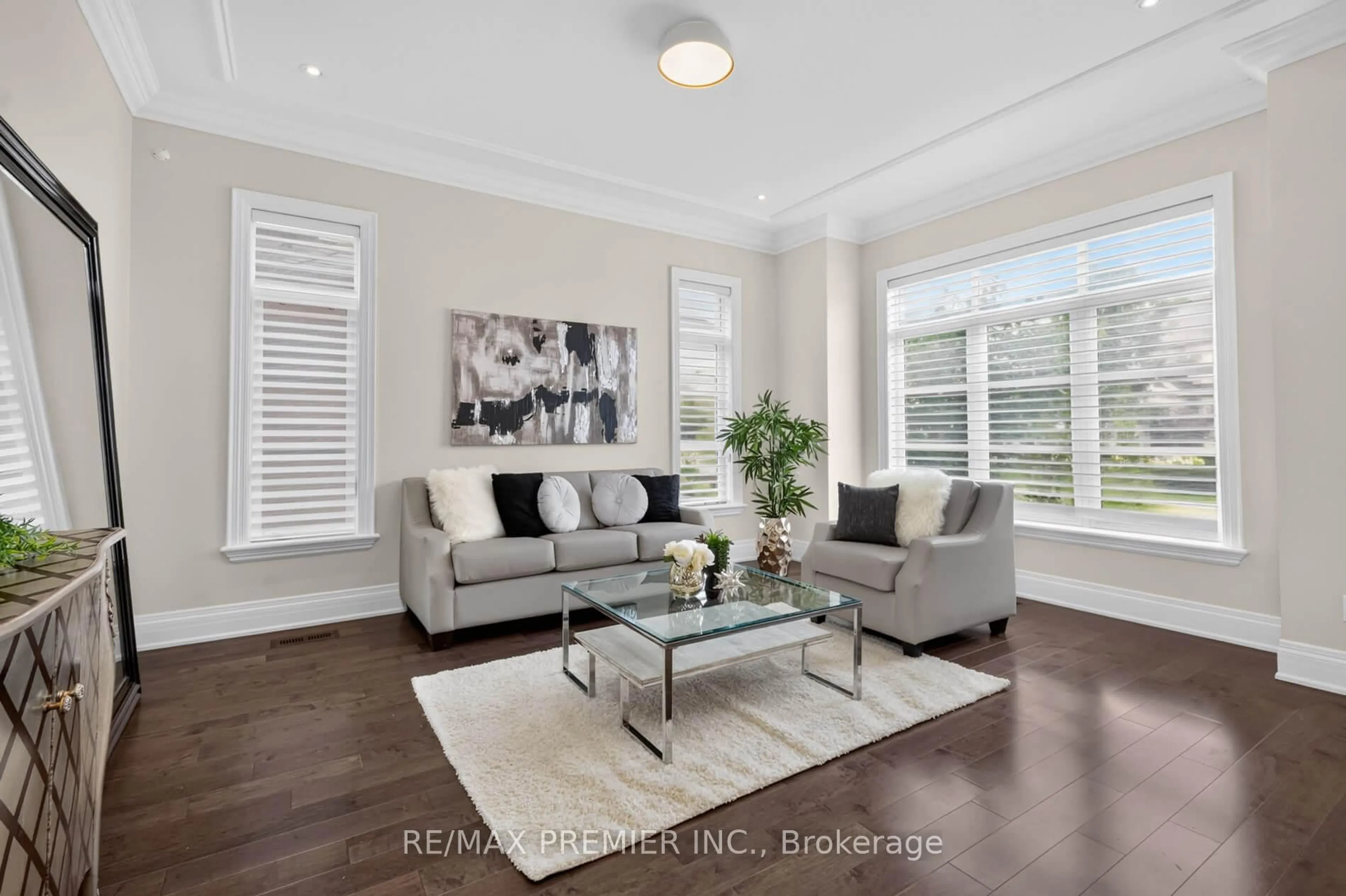 Living room with furniture, wood/laminate floor for 31 Sarracini Cres, Vaughan Ontario L4L 3S9