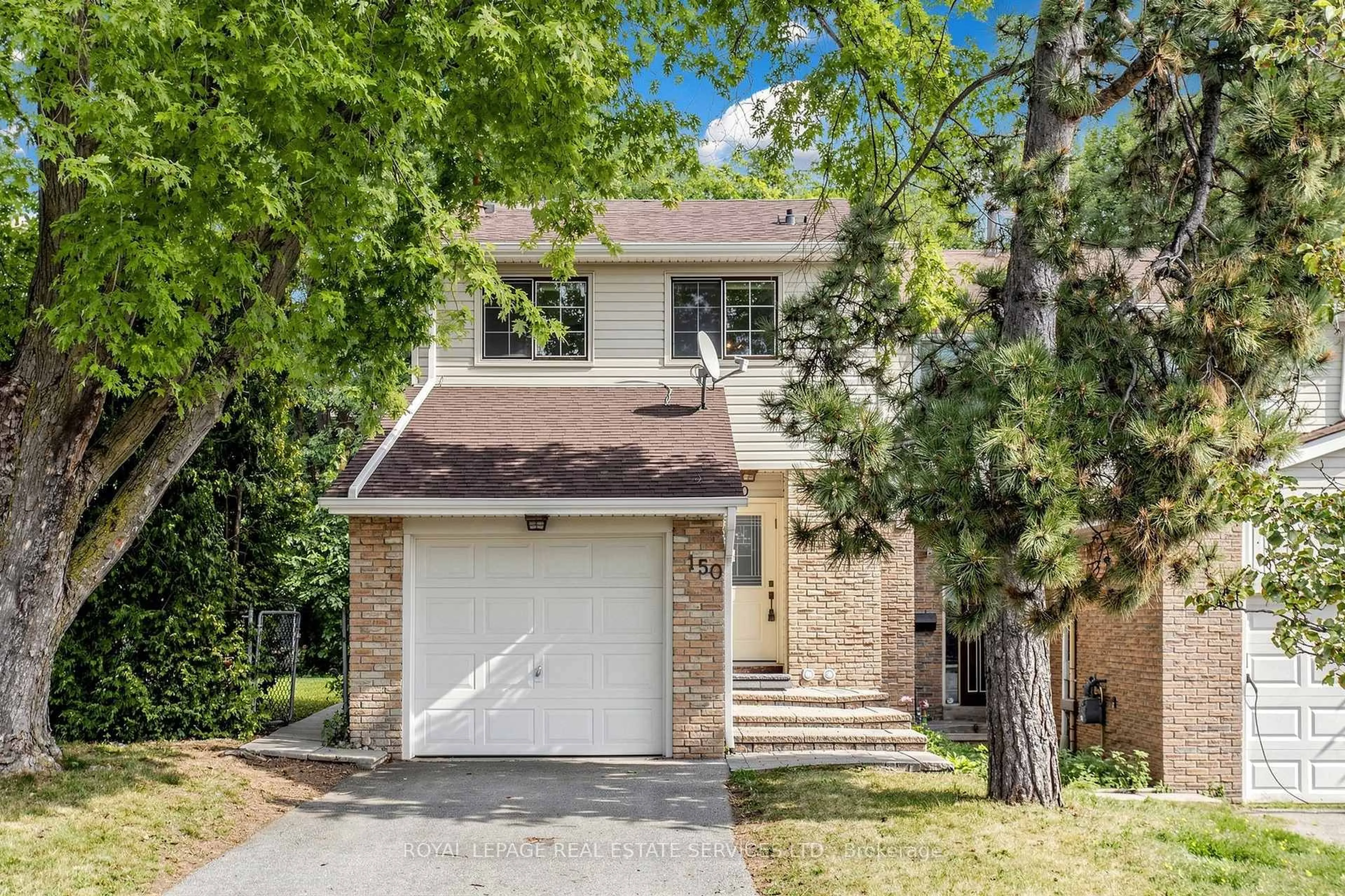 Home with brick exterior material, street for 150 Tamarack Dr, Markham Ontario L3T 4X4
