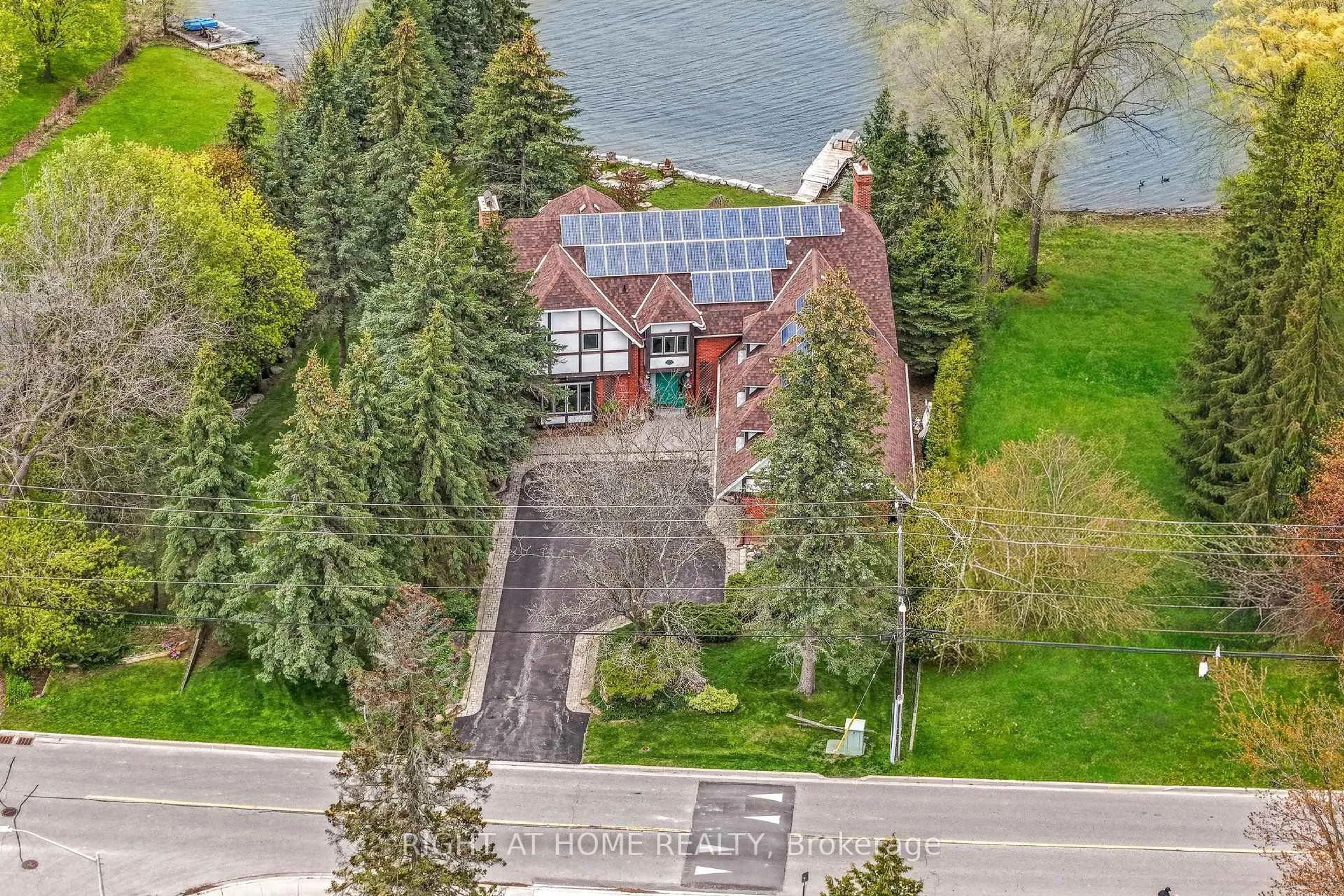 A pic from outside/outdoor area/front of a property/back of a property/a pic from drone, water/lake/river/ocean view for 566 Sunset Beach Rd, Richmond Hill Ontario L4E 3J8