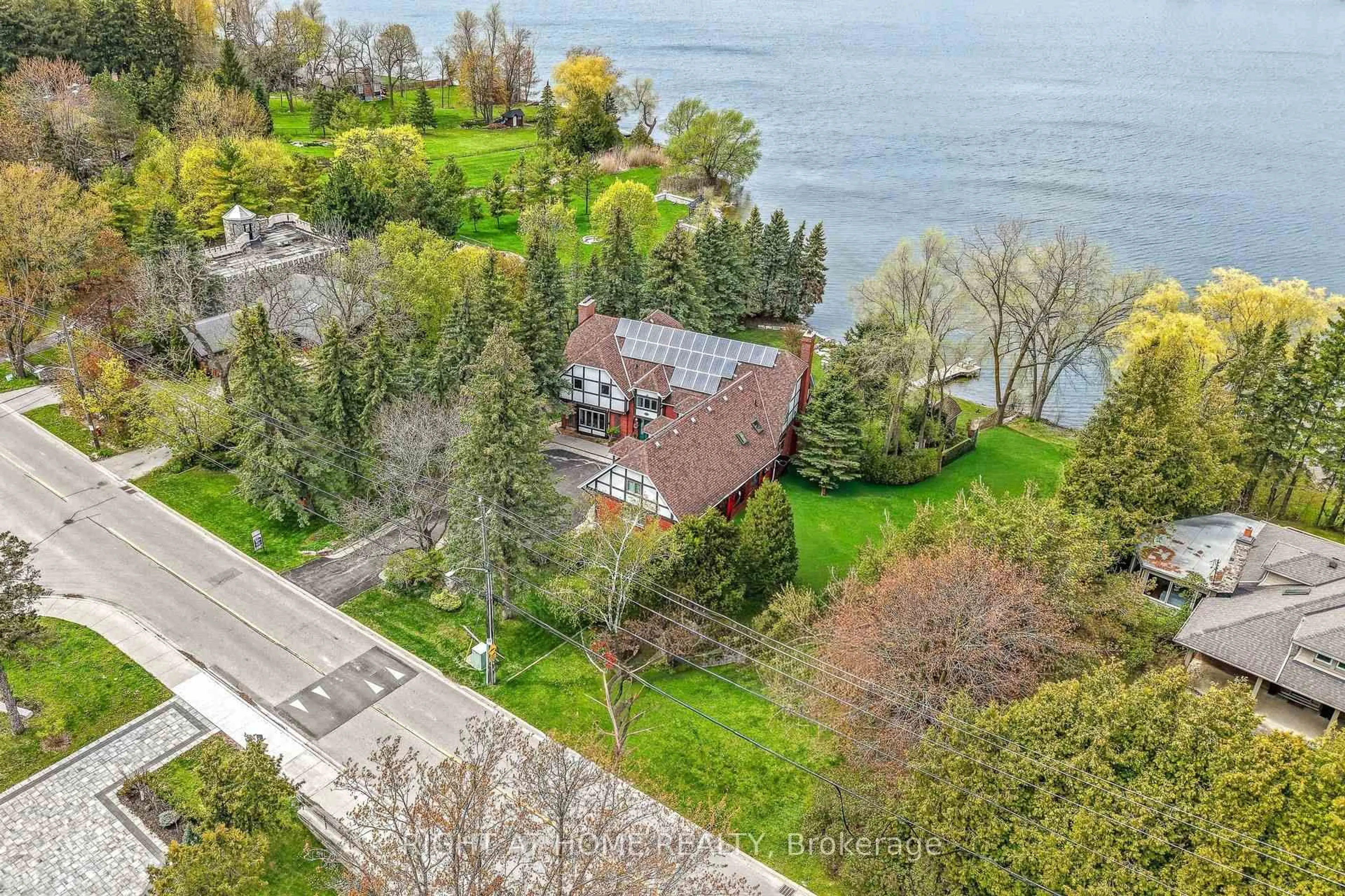 A pic from outside/outdoor area/front of a property/back of a property/a pic from drone, water/lake/river/ocean view for 566 Sunset Beach Rd, Richmond Hill Ontario L4E 3J8