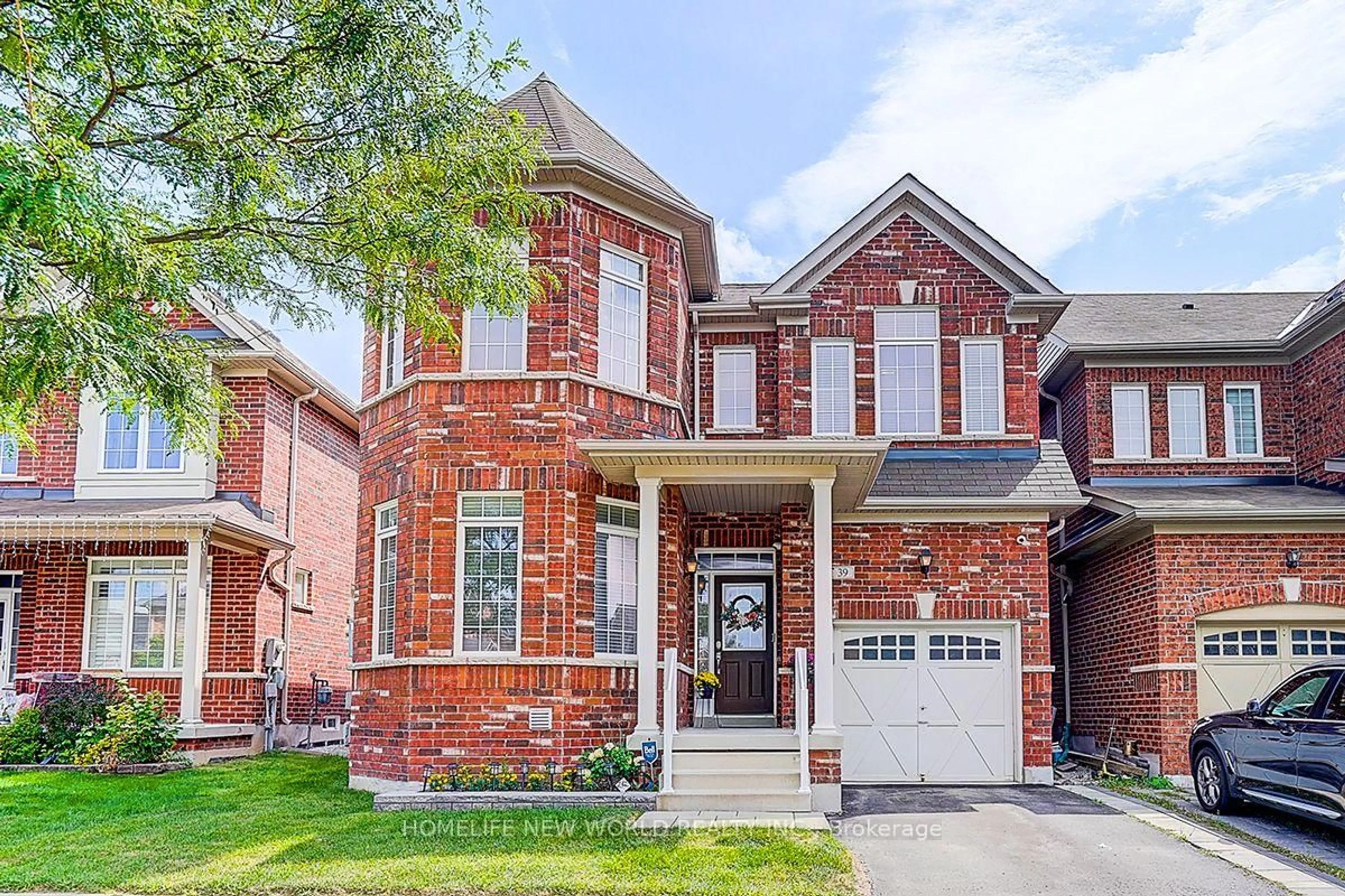 Home with brick exterior material, street for 39 James Parrott Ave, Markham Ontario L6E 0J8