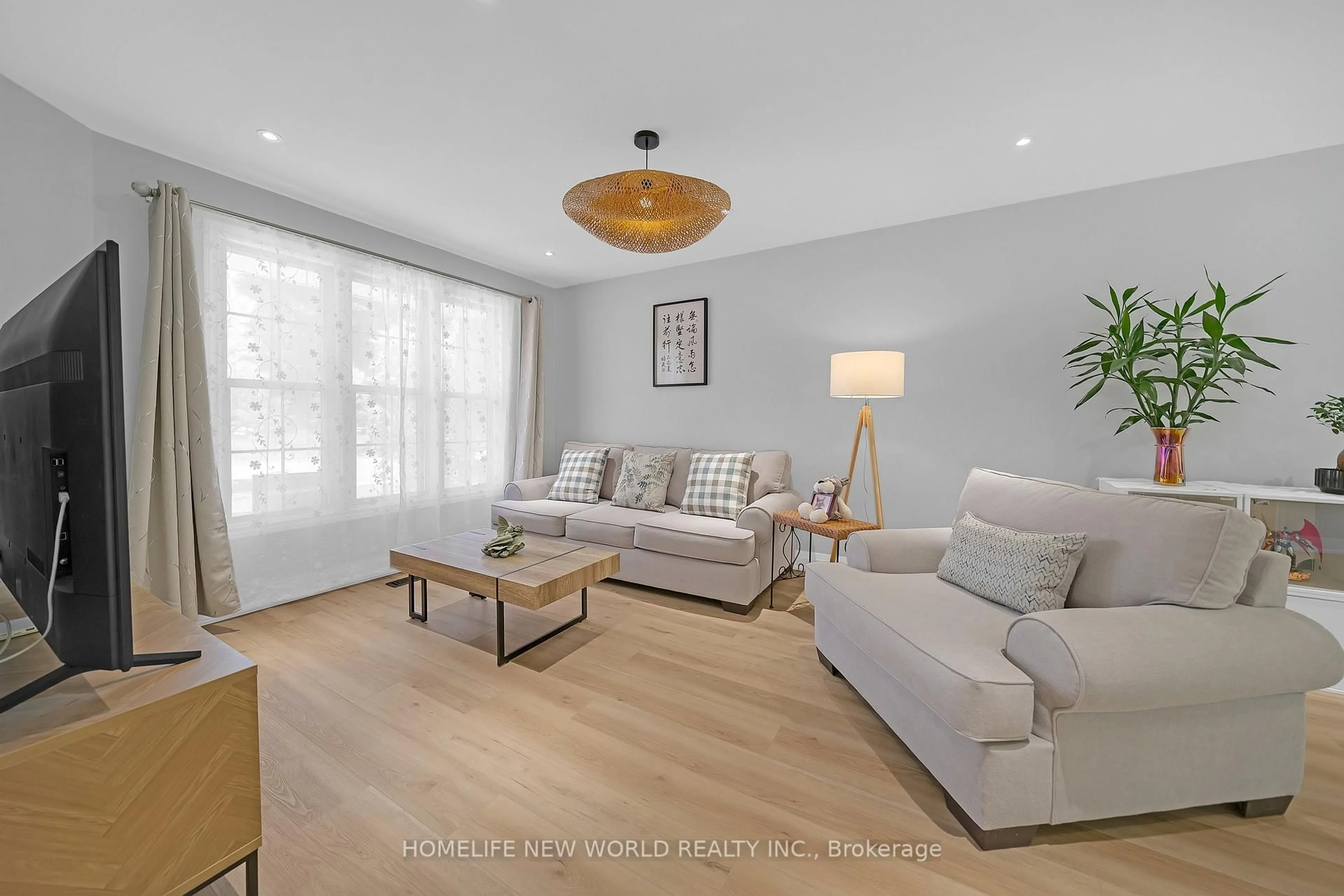Living room with furniture, wood/laminate floor for 351 Millard St, Whitchurch-Stouffville Ontario L4A 5S4