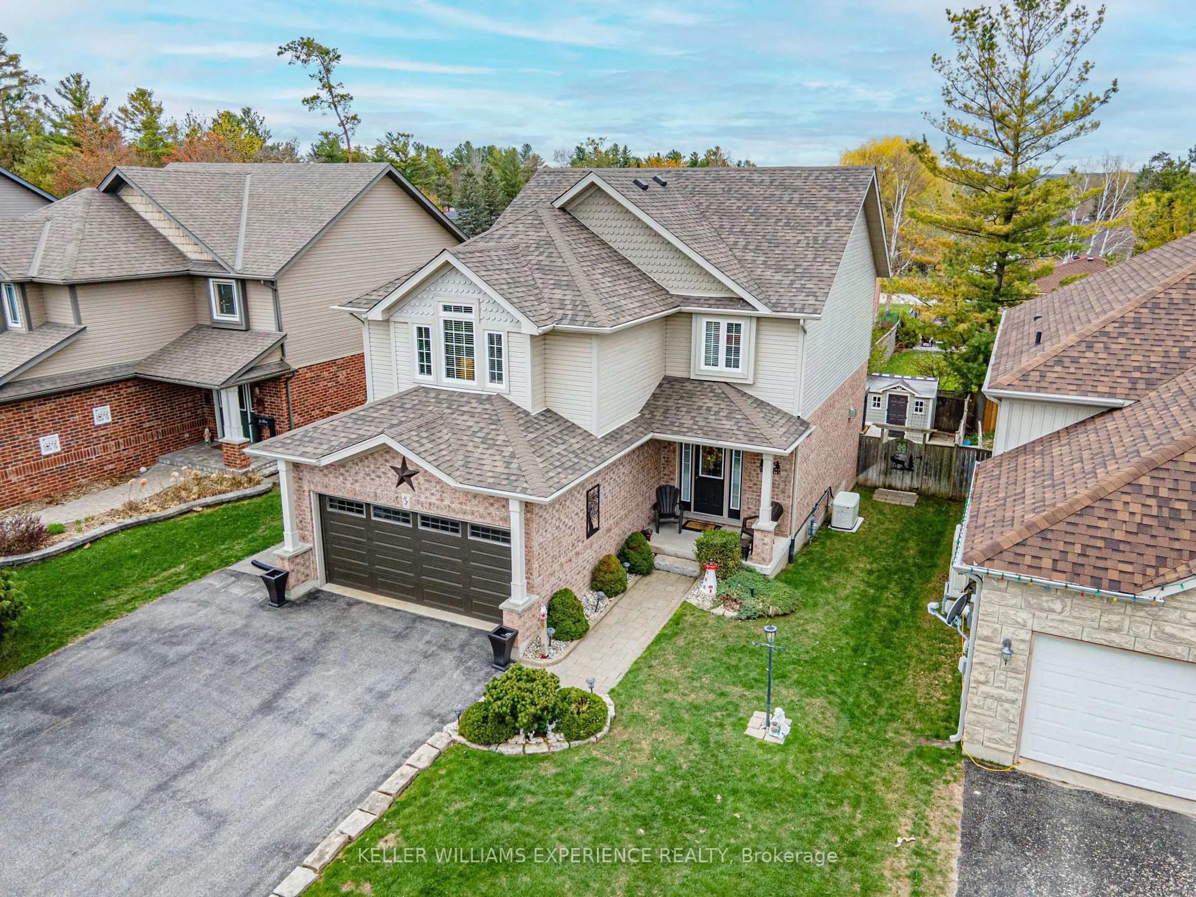 A pic from outside/outdoor area/front of a property/back of a property/a pic from drone, street for 87 Armeda Clow Cres, Essa Ontario L3W 0H6